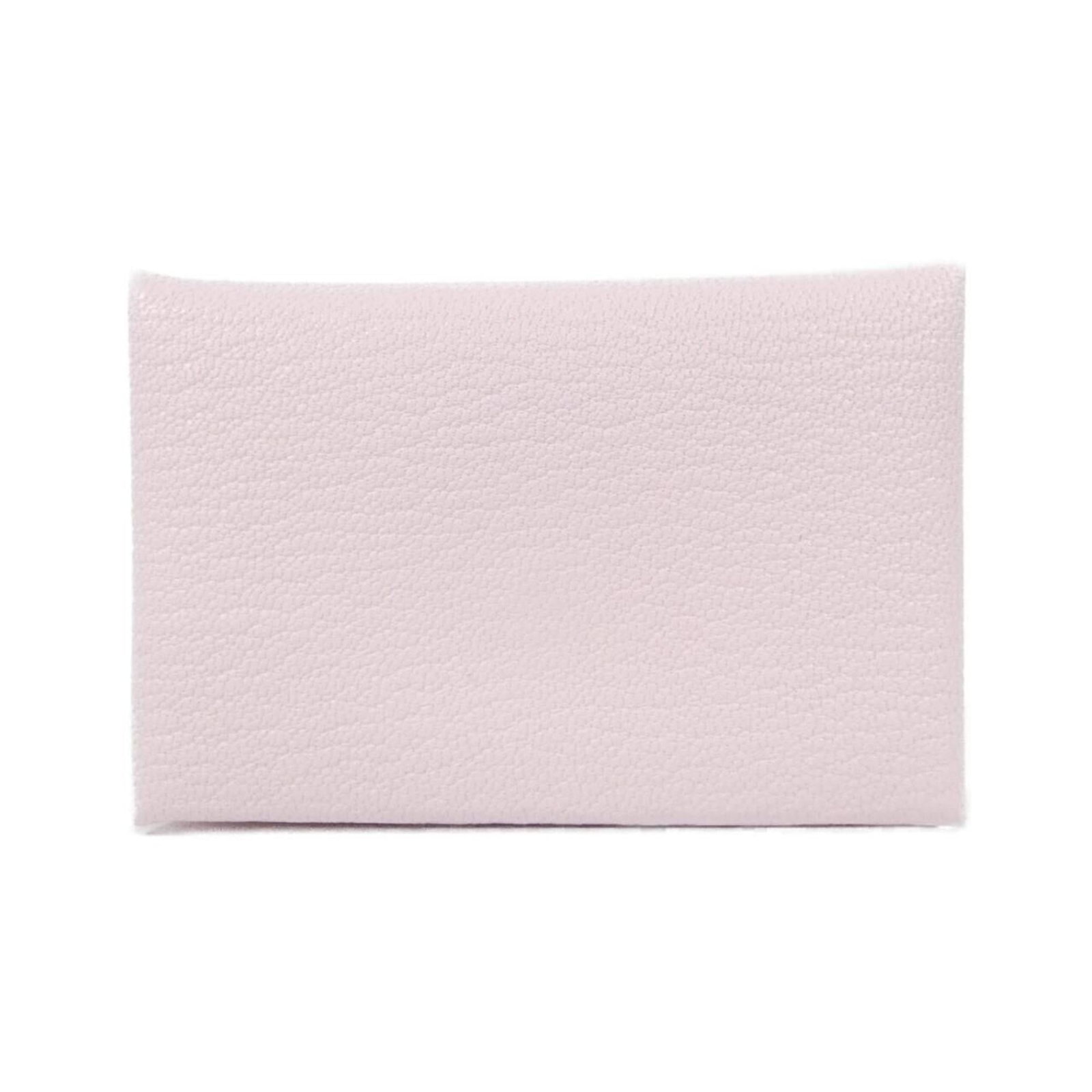 Hermes Card Case Chevre Leather: Hermes Card Case Chevre Leather Light Pink Chevre Leather Card Case from Hermes. This used card case features a few traces of usage and some scratches/dirt, with overall very good condition. It bears 