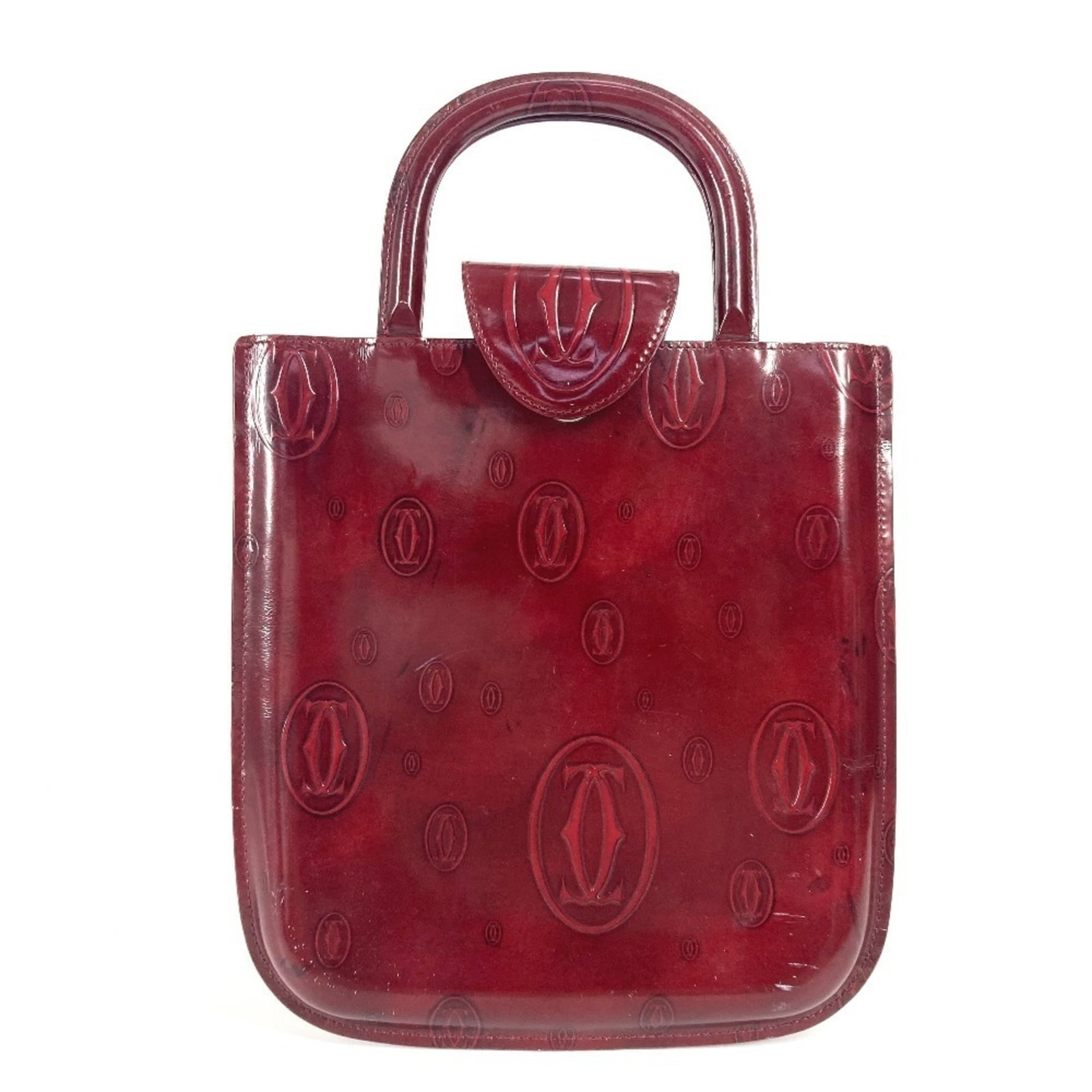 Cartier Handbag Tote Bag Leather: Cartier Handbag Tote Bag Leather Cartier Handbag Tote Bag Leather in Red. This used tote bag features high-quality leather construction and a classic design, with visible traces of usage and minor dam