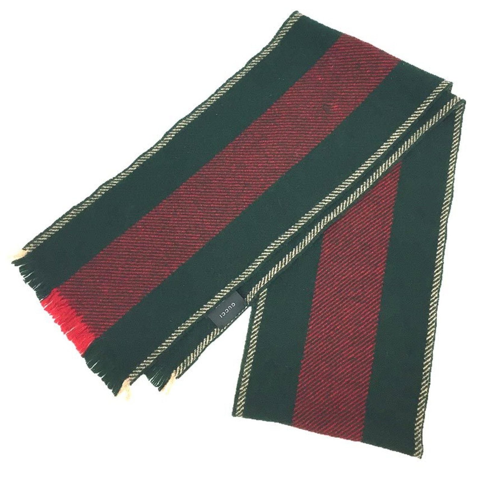 Gucci Stole Wool 100%: Gucci Stole Wool 100% Gucci's iconic stole is made from luxurious 100% wool, offering a tactile experience and a touch of sophistication to any outfit. With its classic design and subtle color palette