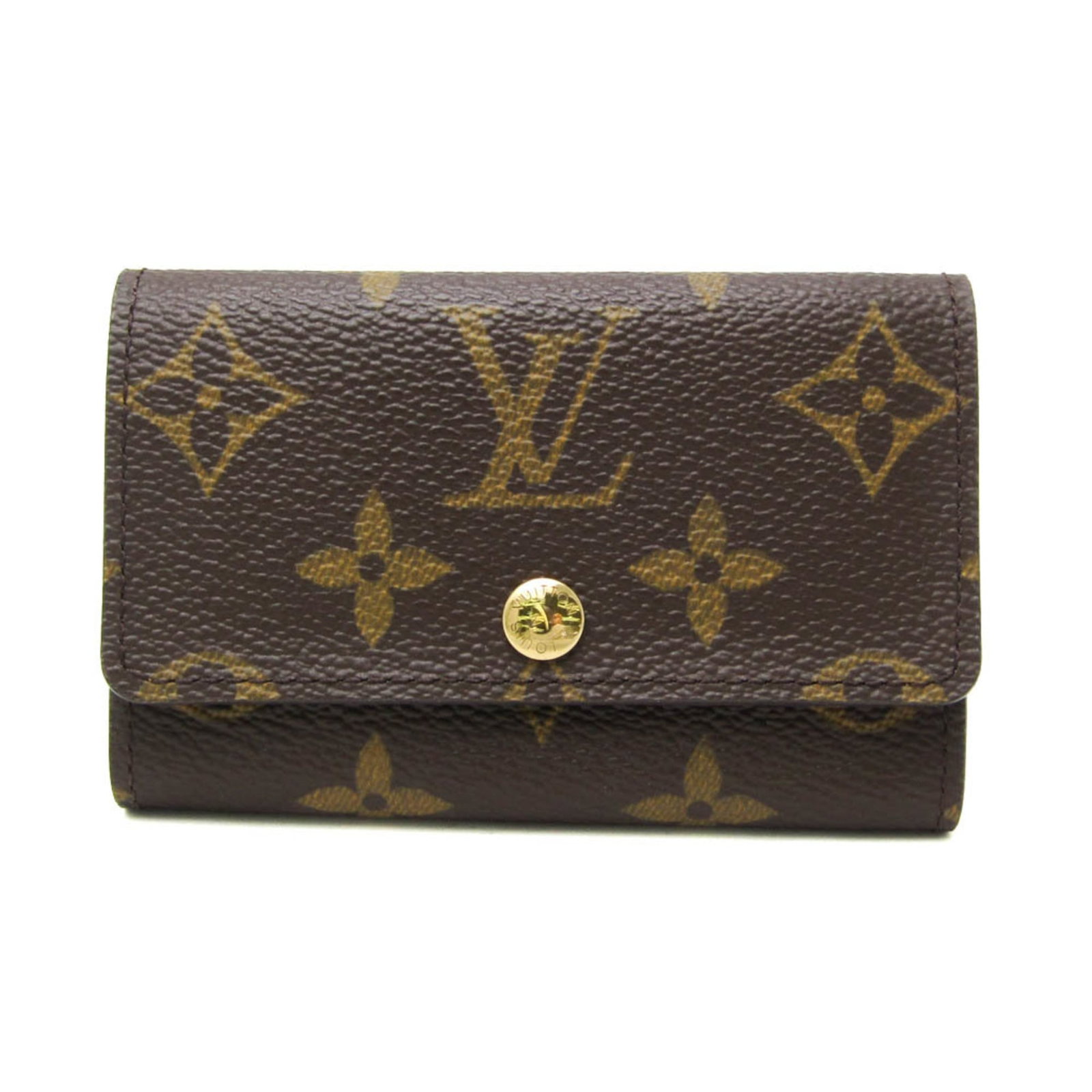 Louis Vuitton Keycase Monogram: Louis Vuitton Keycase Monogram Monogrammed for style and sophistication, this Louis Vuitton Keycase features a classic snap closure and six key hooks. Made from high-quality material, its monogram pat