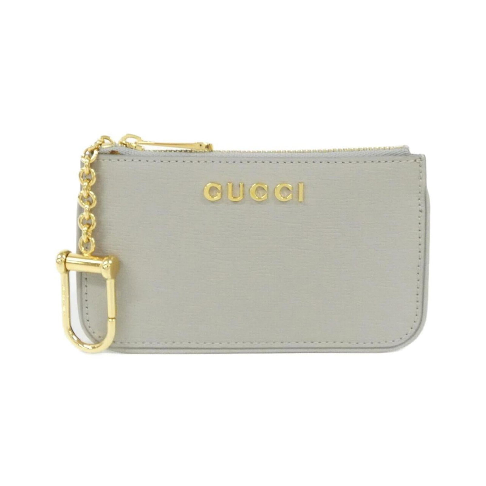 Gucci Coin Purse/Coin Case Leather: Gucci Coin Purse/Coin Case Leather Light gray Gucci leather coin purse/case with clean lines and classic design. Made from high-quality leather, this compact accessory features a subtle size that fits