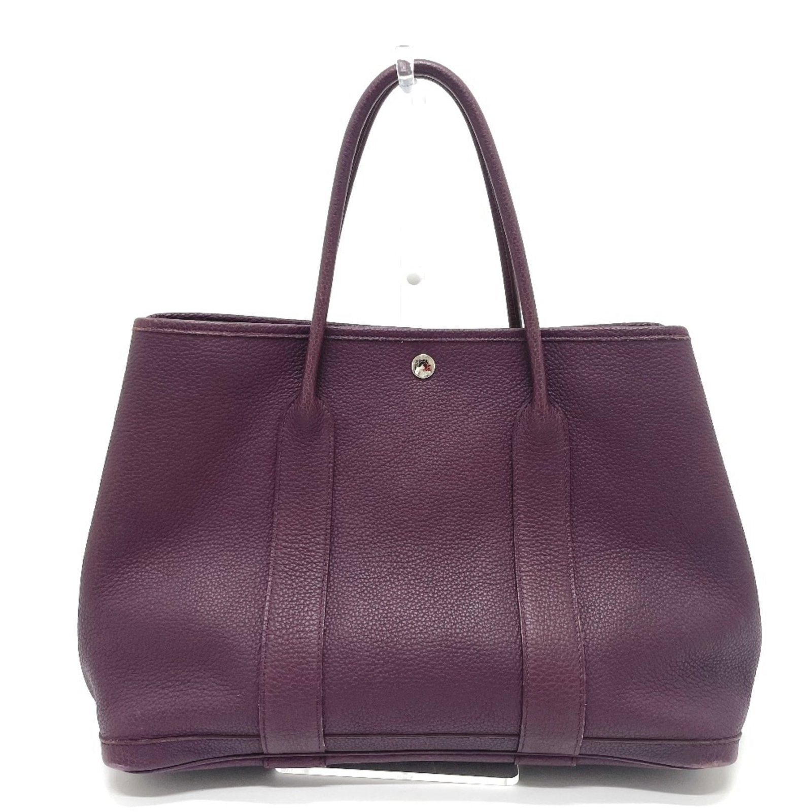 Hermes Tote Bag Negonda Leather: Hermes Tote Bag Negonda Leather Negonda leather tote bag from Herm?s in rich purple hue. This pre-owned tote boasts its original Negonda leather material and classic design, with some visible signs of