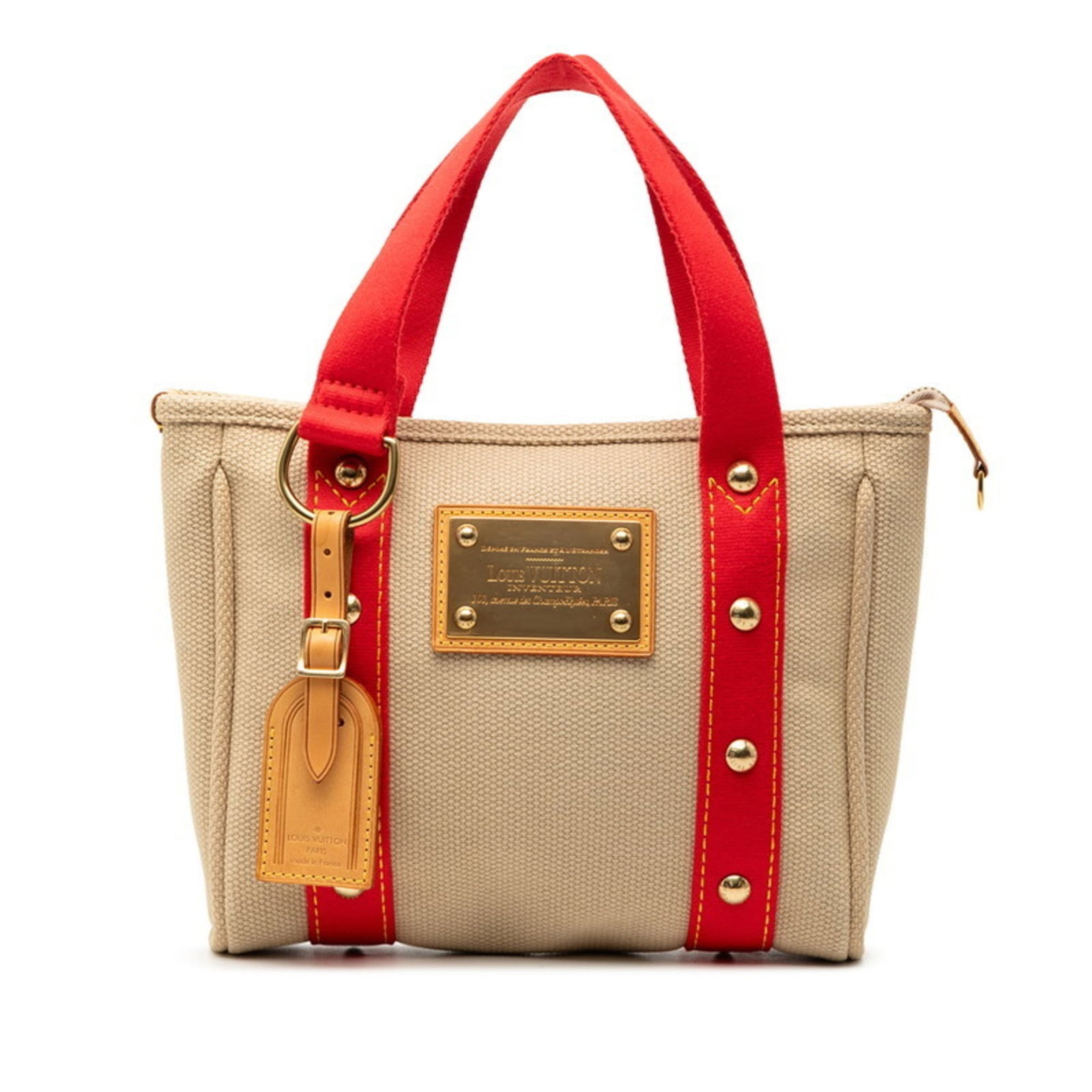 Louis Vuitton Handbag Tote Bag Canvas Leather: Louis Vuitton Handbag Tote Bag Canvas Leather Canvas and leather combine in this classic Louis Vuitton tote bag, offering a timeless design with subtle signs of wear. The beige color provides a