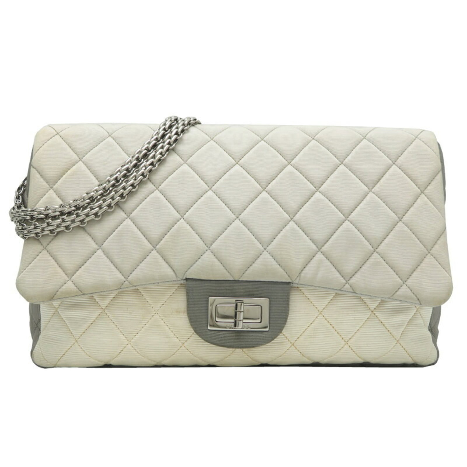 Chanel Shoulder Bag Canvas: Chanel Shoulder Bag Canvas The Chanel Shoulder Bag Canvas in gray and white features a timeless design with clean lines and a classic silhouette. With its canvas material and shoulder strap, this bag 