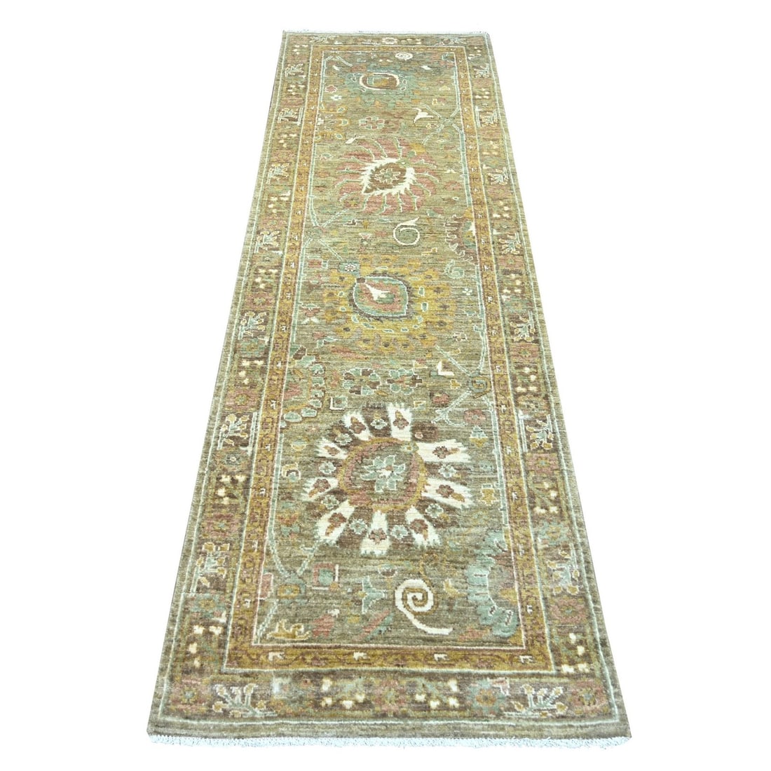 Hand knotted brown wool peshawar rug with leaf design: Hand knotted brown wool peshawar rug with leaf design Hand-knotted in rich brown wool, this exquisite Peshawar-style rug boasts an intricate leaf design that adds depth and visual interest to any room