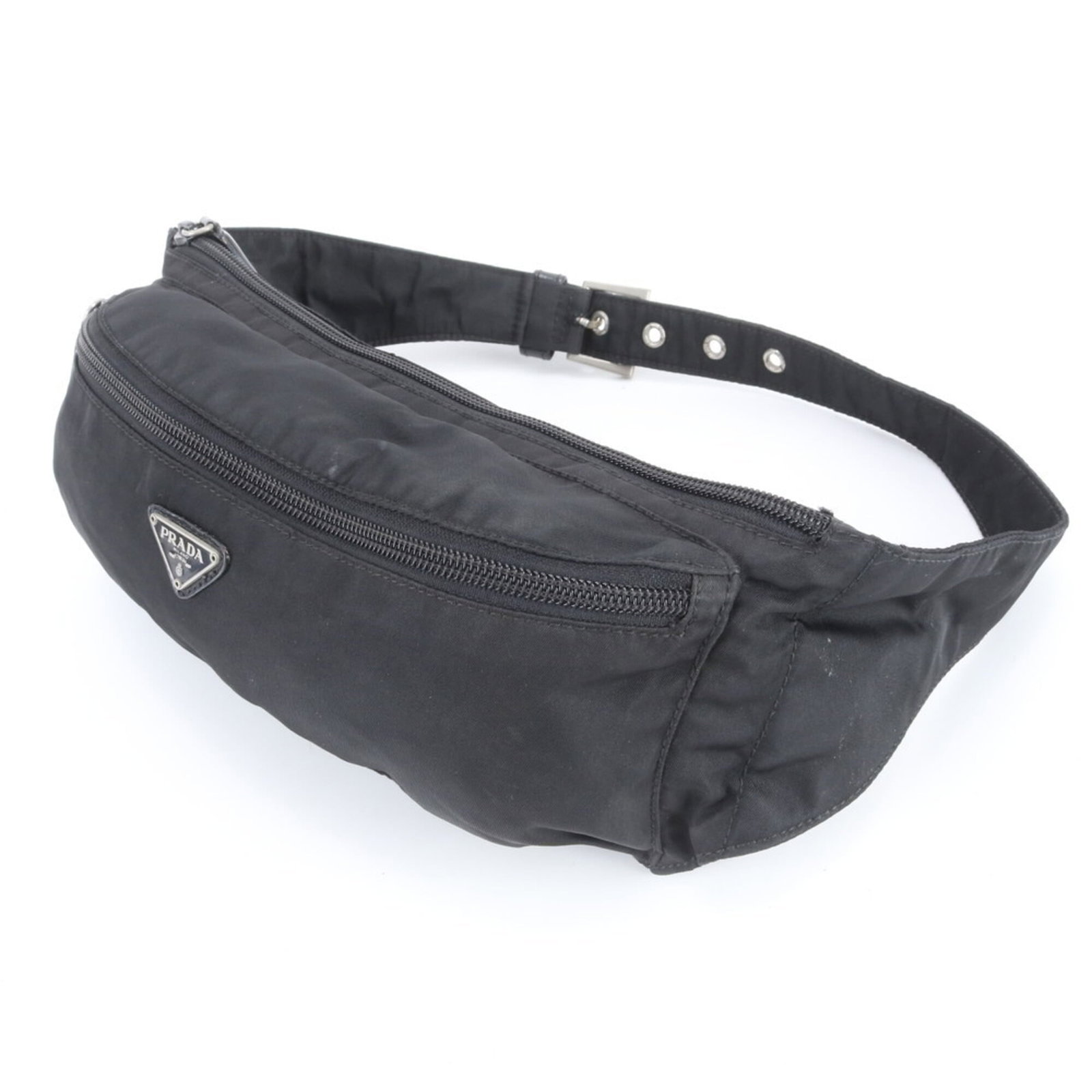 Prada Handbag Sling Bag Nylon Leather: Prada Handbag Sling Bag Nylon Leather Used Prada Handbag Sling Bag in Black Nylon Leather. This versatile bag features a sleek design with a 50cm strap and measures 12cm x 30cm x 7cm. With traces of