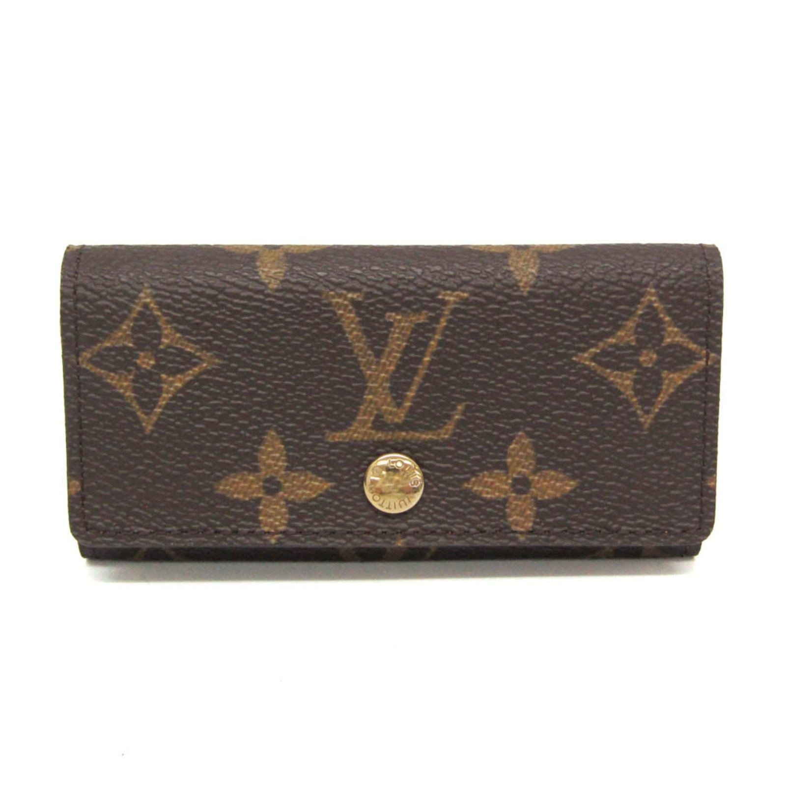 Louis Vuitton Keycase Monogram: Louis Vuitton Keycase Monogram Monogrammed with iconic Louis Vuitton style, this Keycase features a classic snap closure and four key hooks for secure storage. With its timeless design and distinctive