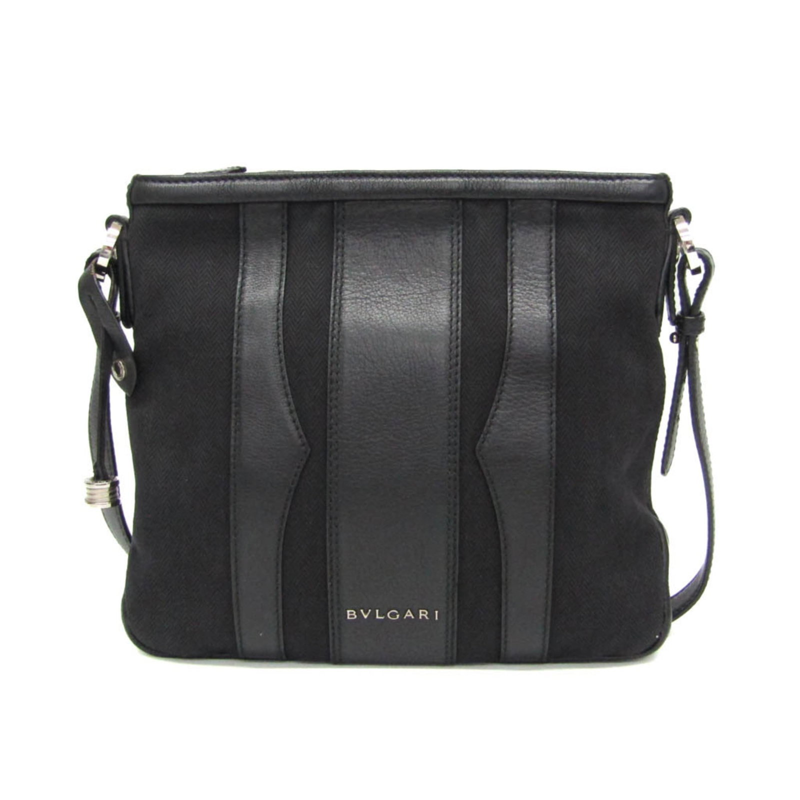 Bvlgari Shoulder Bag Leather Canvas: Bvlgari Shoulder Bag Leather Canvas The Bvlgari Shoulder Bag Leather Canvas boasts sleek black leather and canvas accents, finished with silver hardware for a sophisticated touch. With adjustable stra