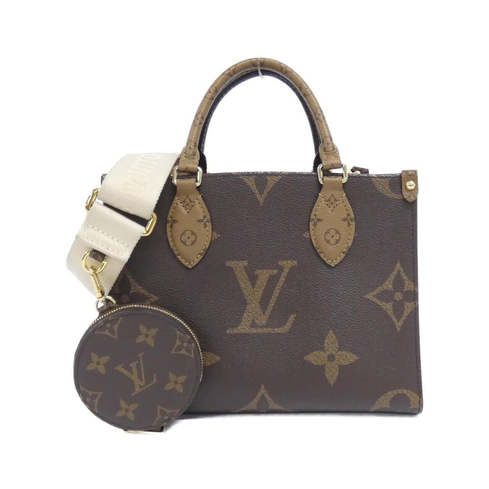Louis Vuitton Handbag Coated Canvas: Louis Vuitton Handbag Coated Canvas Coated canvas construction provides durability and style in this Louis Vuitton handbag. With its brown color and classic design, this bag features a few traces of u