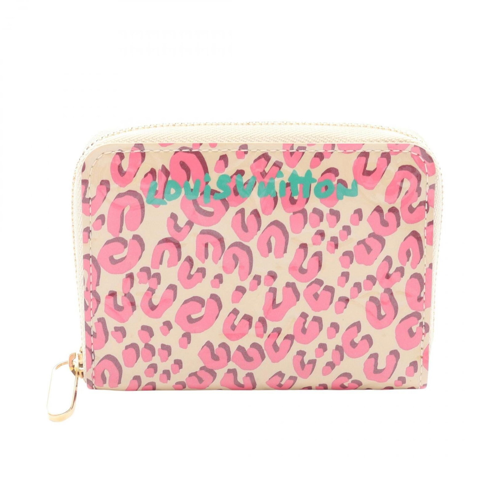 Louis Vuitton Coin Purse/Coin Case Vernis Leather: Louis Vuitton Coin Purse/Coin Case Vernis Leather The Louis Vuitton Coin Purse/Coin Case Vernis Leather features a rich beige color with subtle touches of Blanc Corail and Green. Made from high-qualit