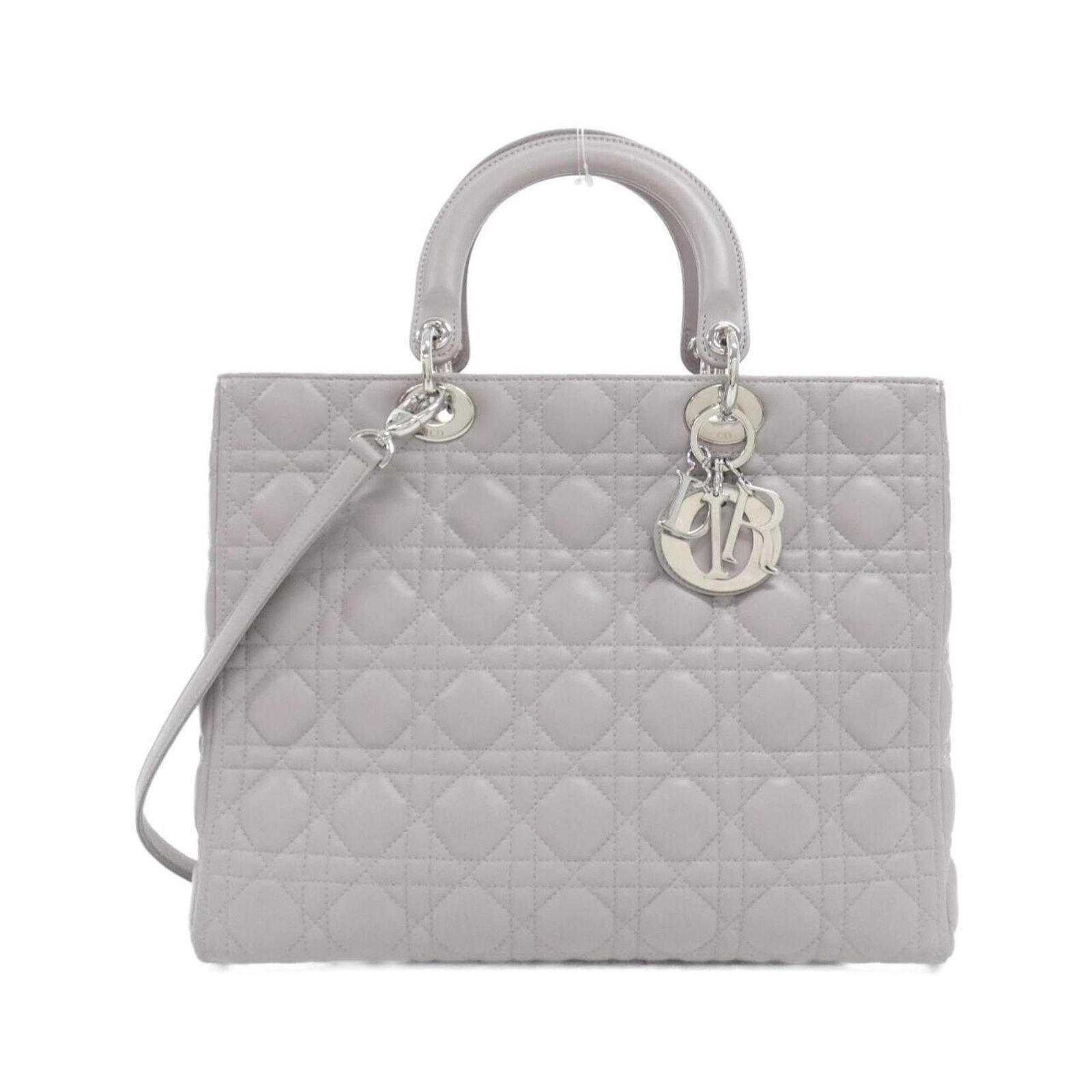 Christian Dior Handbag Leather: Christian Dior Handbag Leather The Christian Dior handbag features high-quality lambskin leather in a beautiful gray and light gray color combination. With its classic design and timeless style, this 
