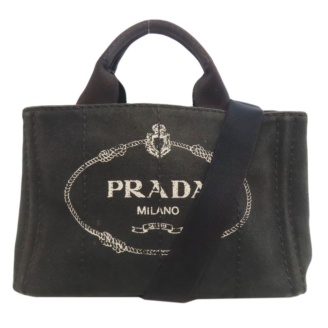 Canapa Canvas Mini Two Way Handbag Prada: Canapa Canvas Mini Two Way Handbag Prada Canvas exterior in black, this mini two-way handbag from PRADA boasts a sleek design. The bag's canvas material provides a unique texture and look, while its c
