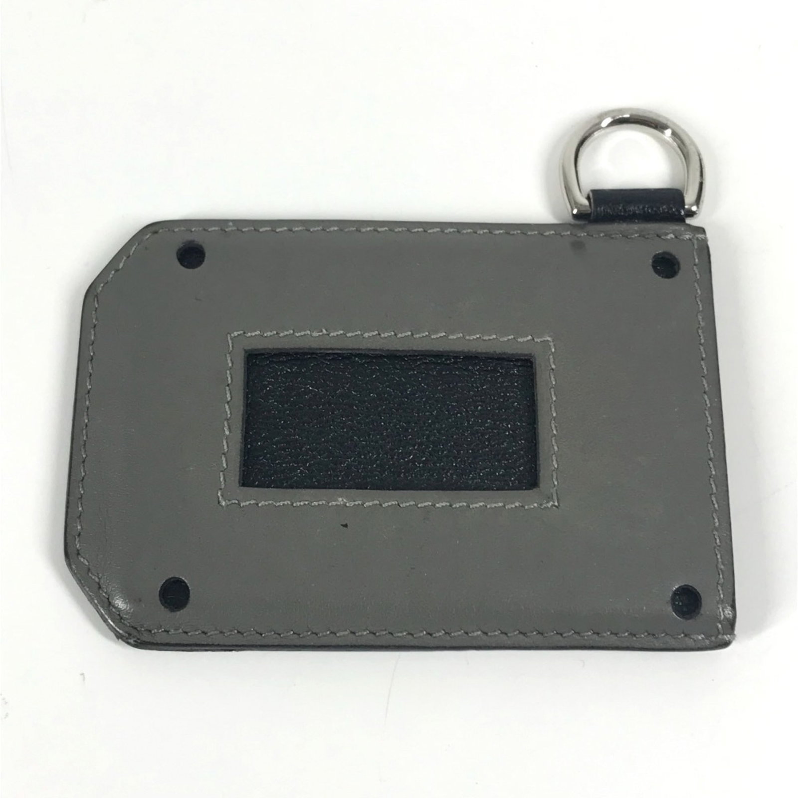 Hermes Card Case Leather: Hermes Card Case Leather This Herm?s card case features a timeless design with a bicolor, black, and gray leather construction. The classic style boasts a durable yet supple material, showcasing signs