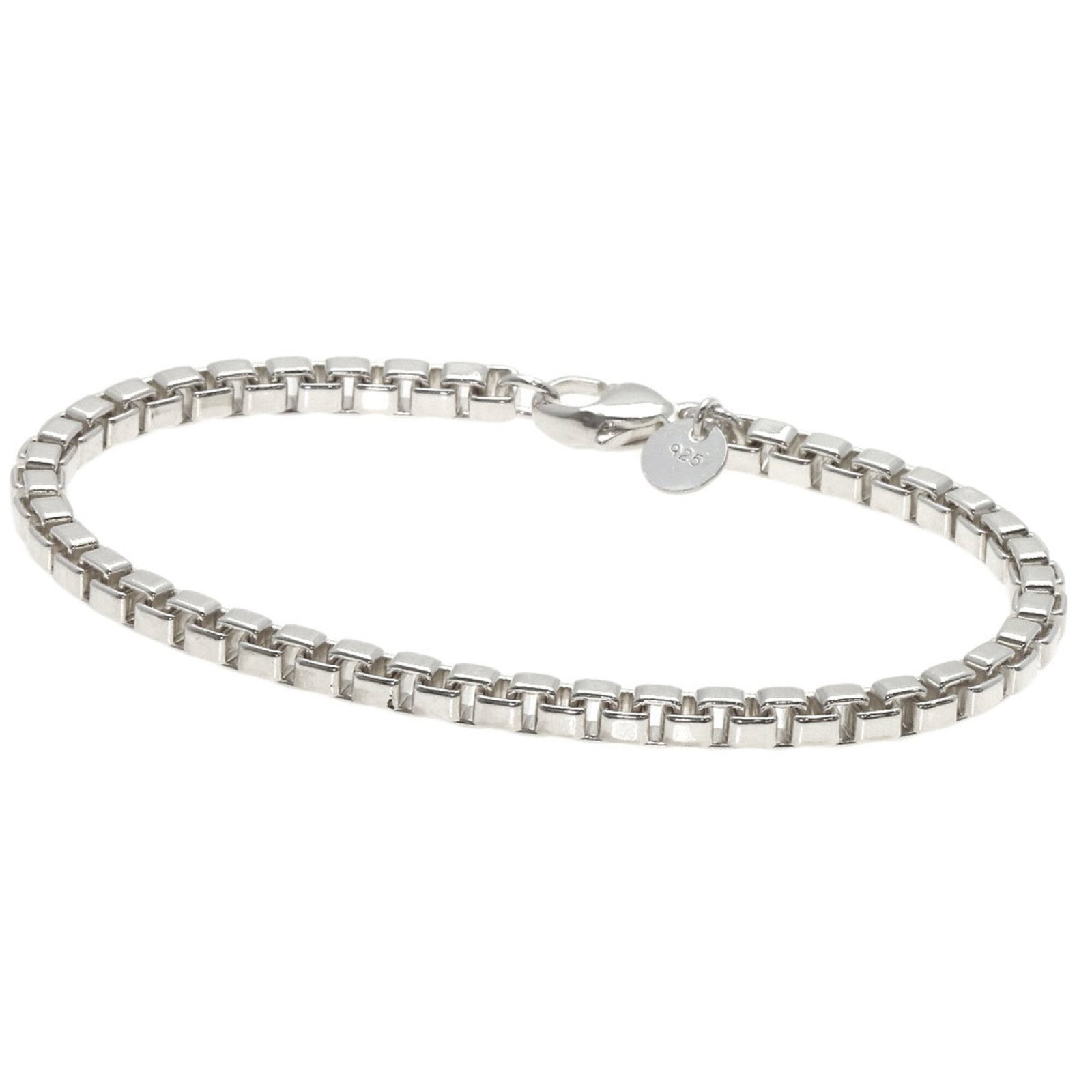 Tiffany Charm Bracelet Silver: Tiffany Charm Bracelet Silver Tiffany Charm Bracelet Silver features an 18cm / 7.08'' length made from silver material. The charm bracelet has some scratches and dirt, with only a few traces of usage,