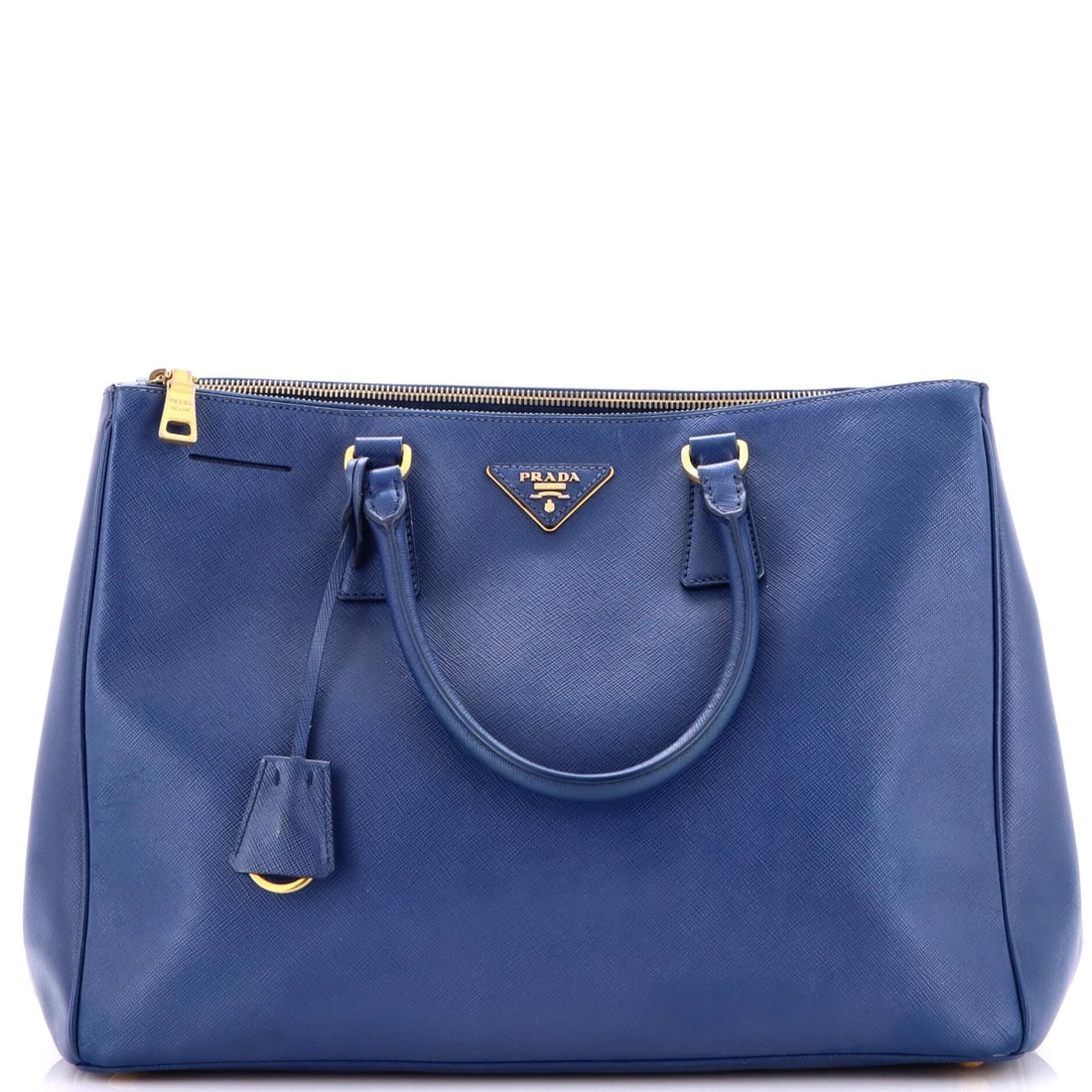 Double zip tote made from saffiano leather: Double zip tote made from saffiano leather Saffiano leather construction provides durability and sophistication. The Double Zip Lux Tote boasts two functional zippers for added convenience. Measuring 