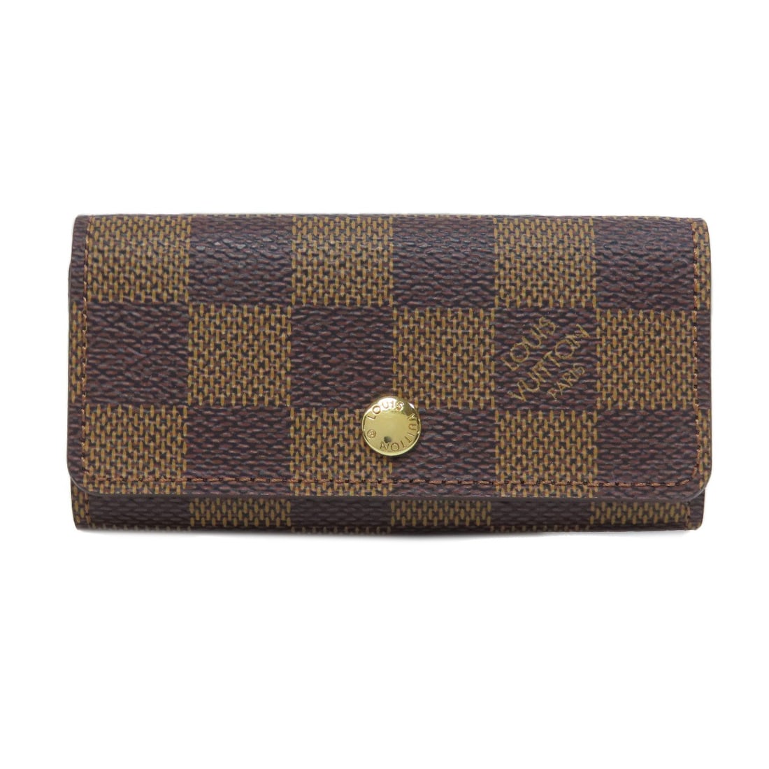 Key Holder Damier Canvas Multicles4 Louis Vuitton: Key Holder Damier Canvas Multicles4 Louis Vuitton Damier canvas in Ebene color, this LOUIS VUITTON key holder features a classic brown exterior. The iconic Damier pattern adds visual interest to this