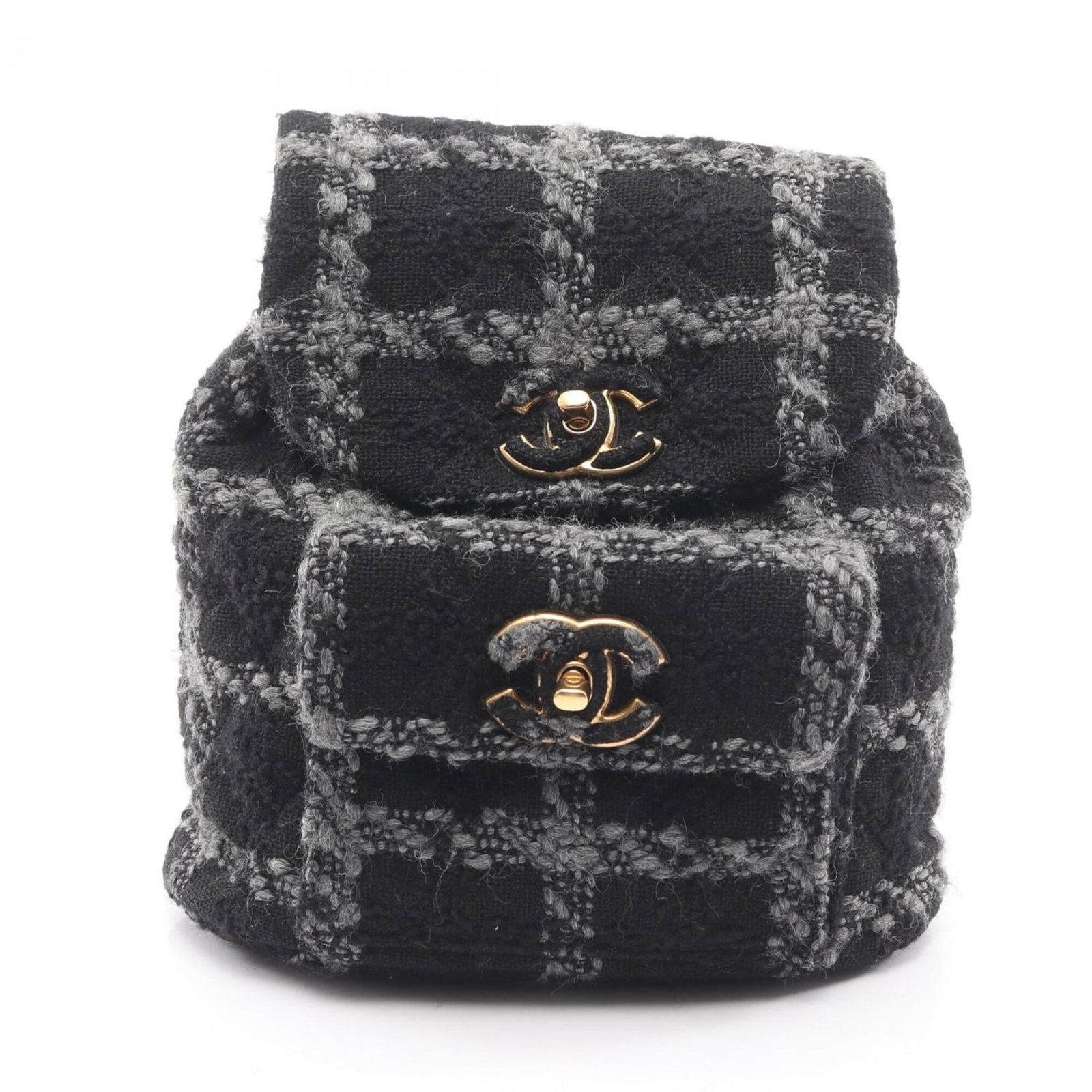 Chanel Backpack Handbag Wool: Chanel Backpack Handbag Wool Black and gray wool Chanel backpack handbag with a classic design. The bag has some minor scratches and dirt, but overall remains in very good condition. Its timeless styl