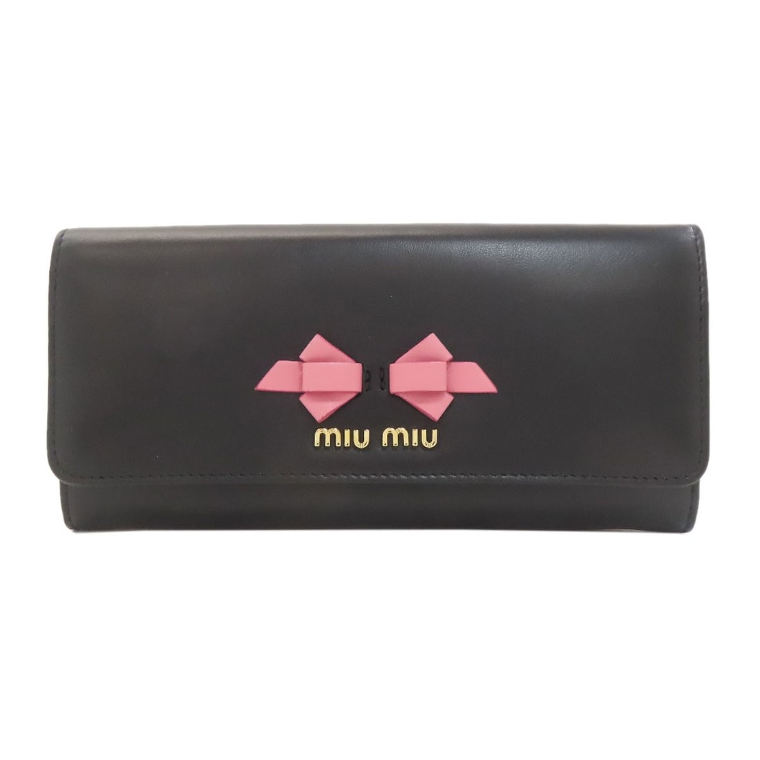 Ribbon motif long wallet leather coin pocket with: Ribbon motif long wallet leather coin pocket with Long wallet with coin pocket made from black leather features a ribbon motif design. The exterior color matches the interior, creating a sleek and coh