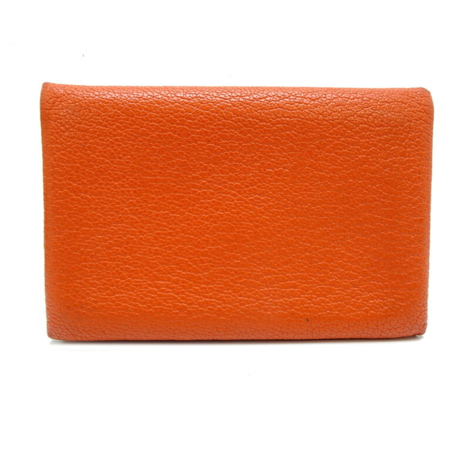 Hermes Coin Purse/Coin Case Chevre Leather: Hermes Coin Purse/Coin Case Chevre Leather This iconic Hermes coin purse features vibrant orange chevre leather and is crafted with timeless elegance. With its compact size and classic design, it's pe