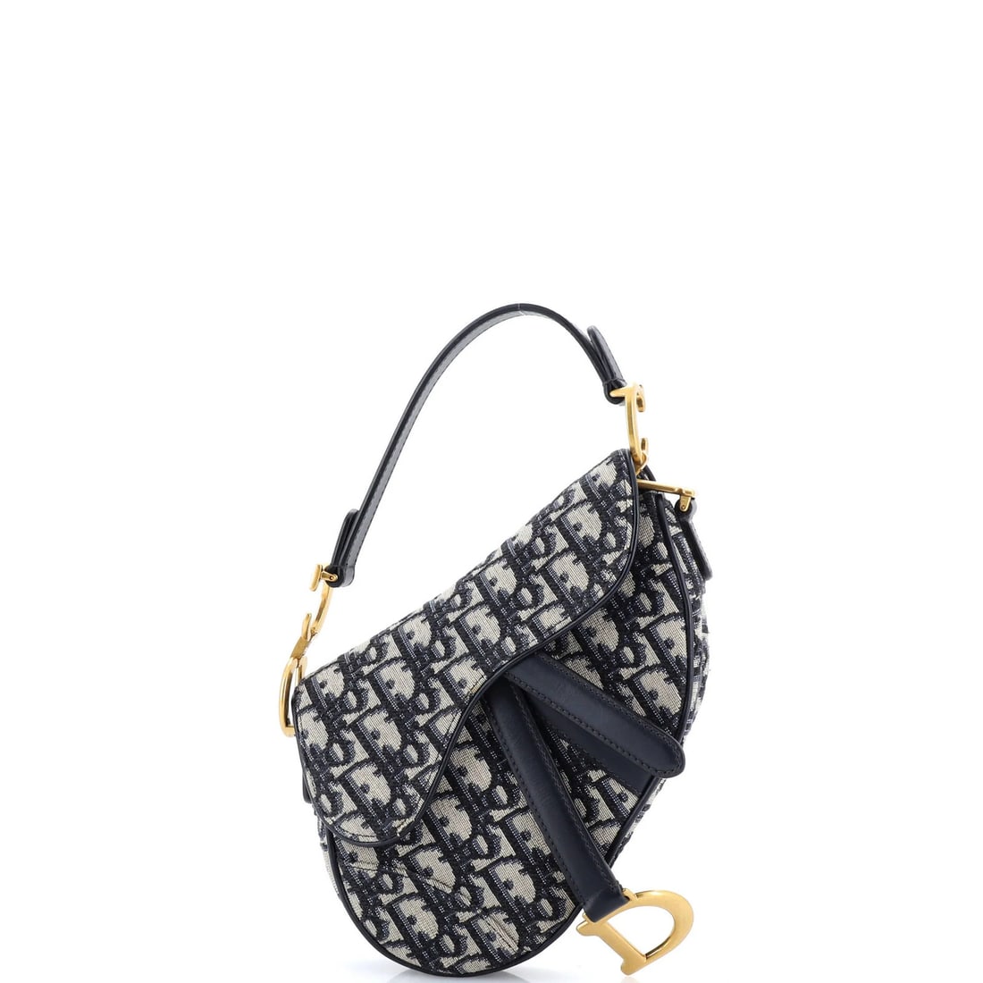 Dior Saddle Oblique Mini Handbag Canvas: Dior Saddle Oblique Mini Handbag Canvas The Dior Saddle Oblique Mini Handbag Canvas boasts a striking blue canvas exterior and neutral interior, perfectly balanced in its classic design. With minor sc