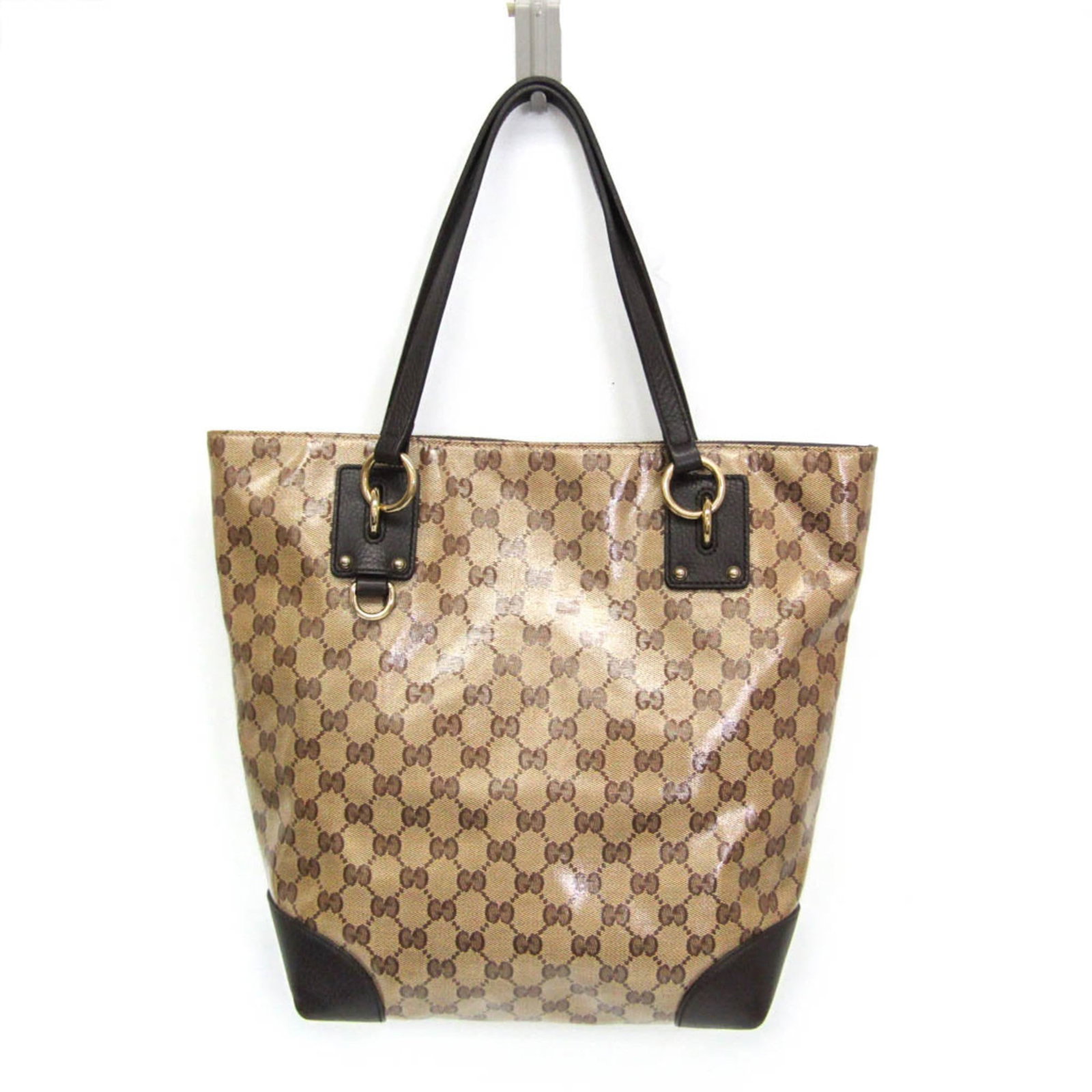 Gucci Tote Bag Pvc Leather: Gucci Tote Bag Pvc Leather Gucci's iconic tote bag boasts a unique blend of Pvc and leather materials in its distinctive beige and dark brown hues. Measuring 31cm x 25cm x 13cm, this versatile bag fea