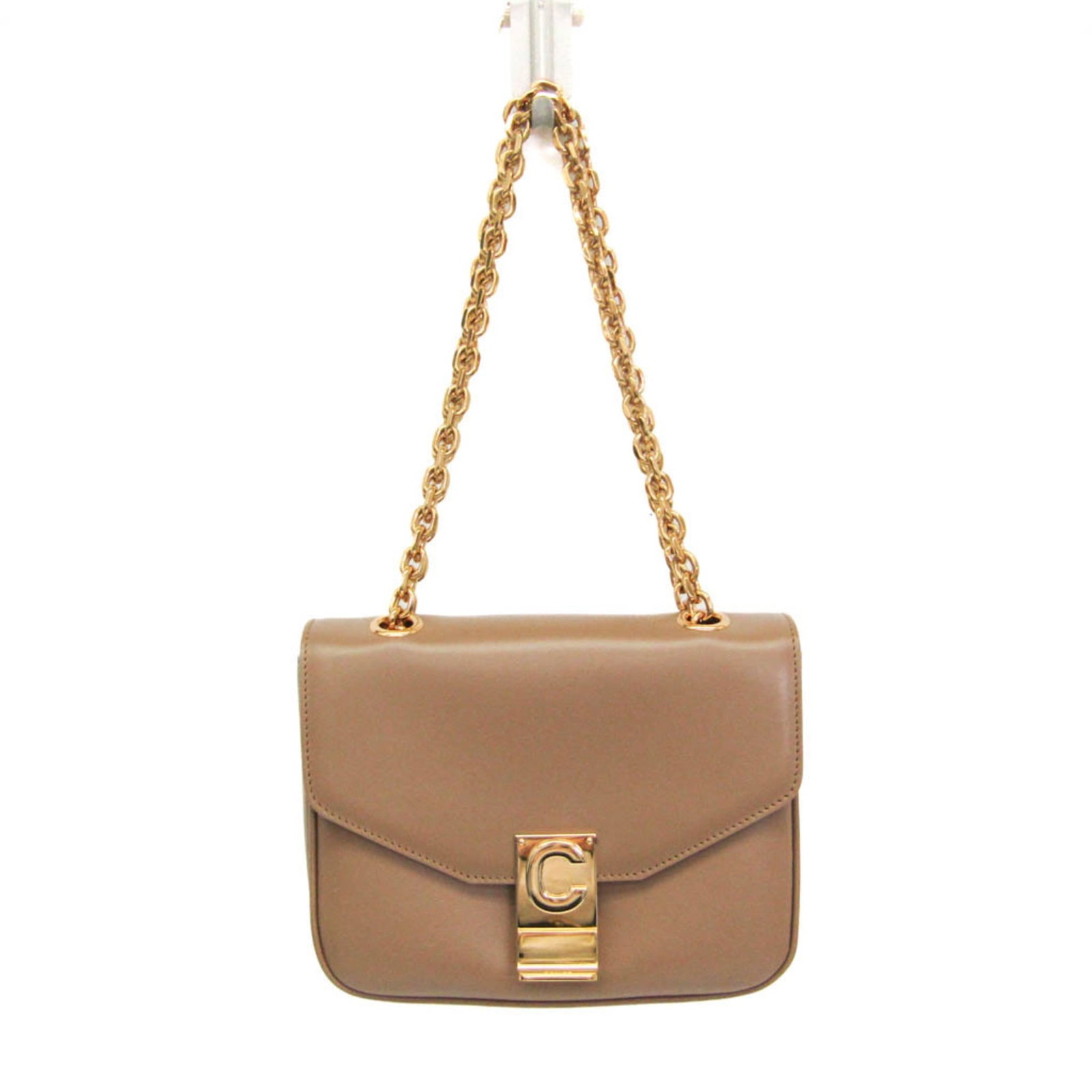 Celine Handbag Shoulder Bag Leather: Celine Handbag Shoulder Bag Leather The Celine Handbag Shoulder Bag Leather features a light beige leather exterior with a fastener closure and an inner zipper pocket. Measuring 14cm x 18.5cm x 5cm, t