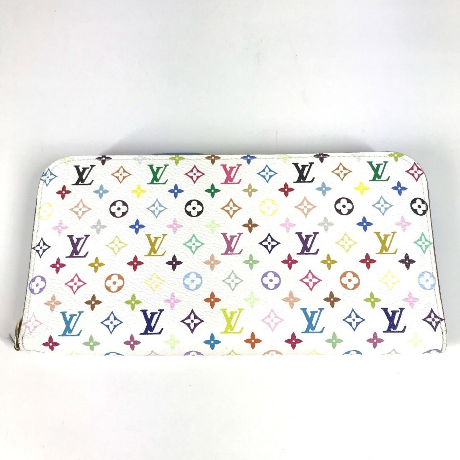 Louis Vuitton Long Wallet (Bi-Fold) Monogram Multicolore: Louis Vuitton Long Wallet (Bi-Fold) Monogram Multicolore The Louis Vuitton Long Wallet (Bi-Fold) Monogram Multicolore features a striking multicolored design with iconic blue and monogram patterns. Wi