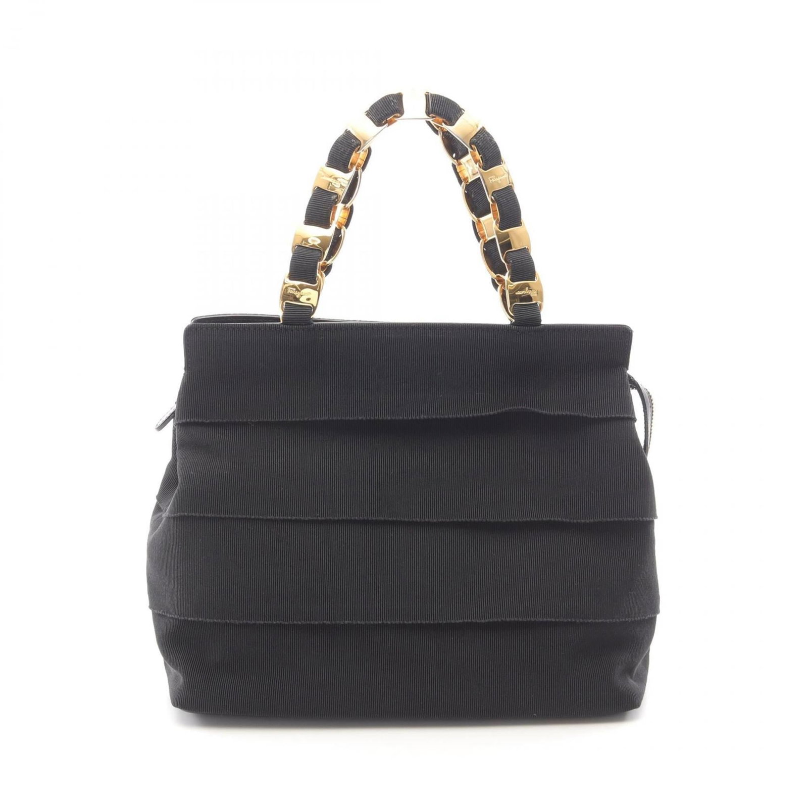 Salvatore Ferragamo Handbag Nylon Leather: Salvatore Ferragamo Handbag Nylon Leather Salvatore Ferragamo's iconic handbag combines sleek nylon and leather in a timeless black design. With its durable construction and classic silhouette, this v