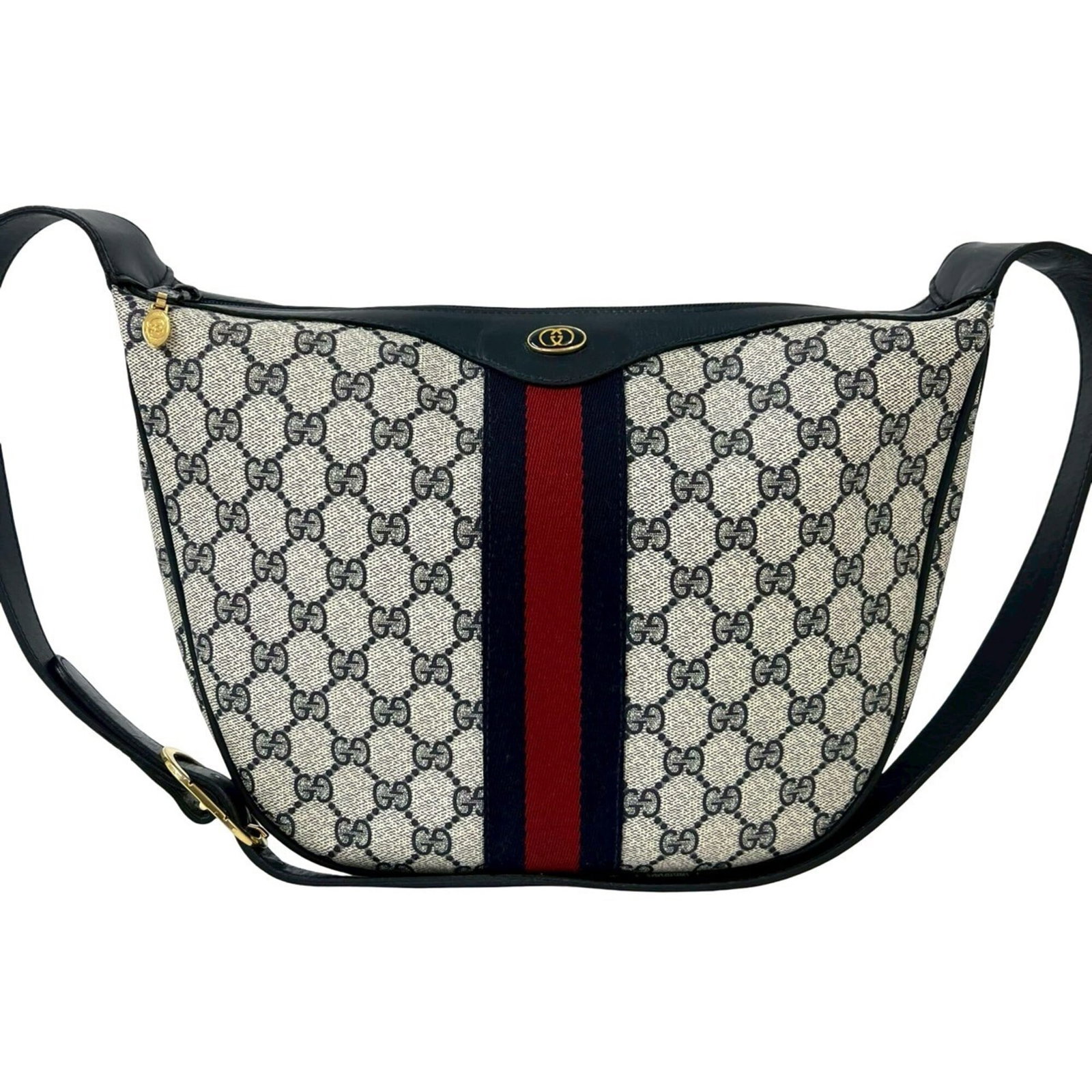 Gucci Shoulder Bag Pvc Leather: Gucci Shoulder Bag Pvc Leather Gucci's iconic shoulder bag features a striking navy and red color combination. Made from high-quality pvc leather, this versatile bag boasts a sleek design with a class