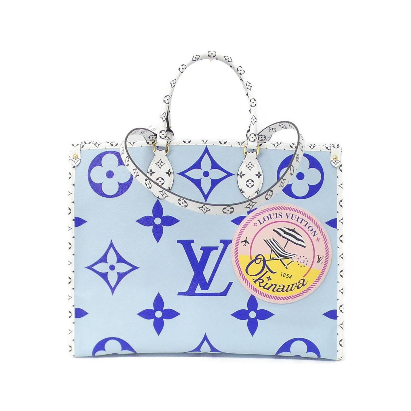 Louis Vuitton Handbag Coated Canvas: Louis Vuitton Handbag Coated Canvas Used Louis Vuitton Handbag in Blue Coated Canvas with Gold Hardware. This women's handbag features a classic design and durable coated canvas material, with some