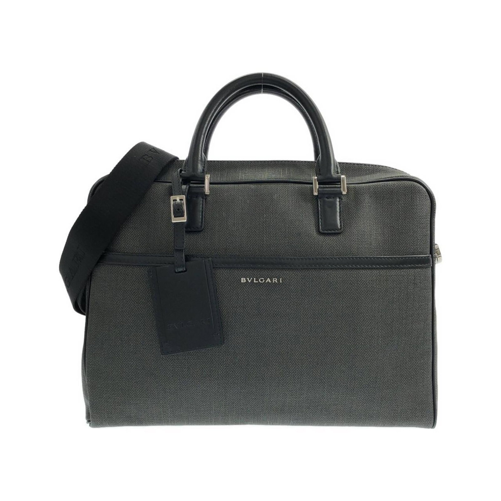 Bvlgari Handbag Coated Canvas Leather: Bvlgari Handbag Coated Canvas Leather Bvlgari's iconic handbag boasts a unique blend of style and durability with its coated canvas leather exterior. The calfskin interior adds a touch of sophisticati