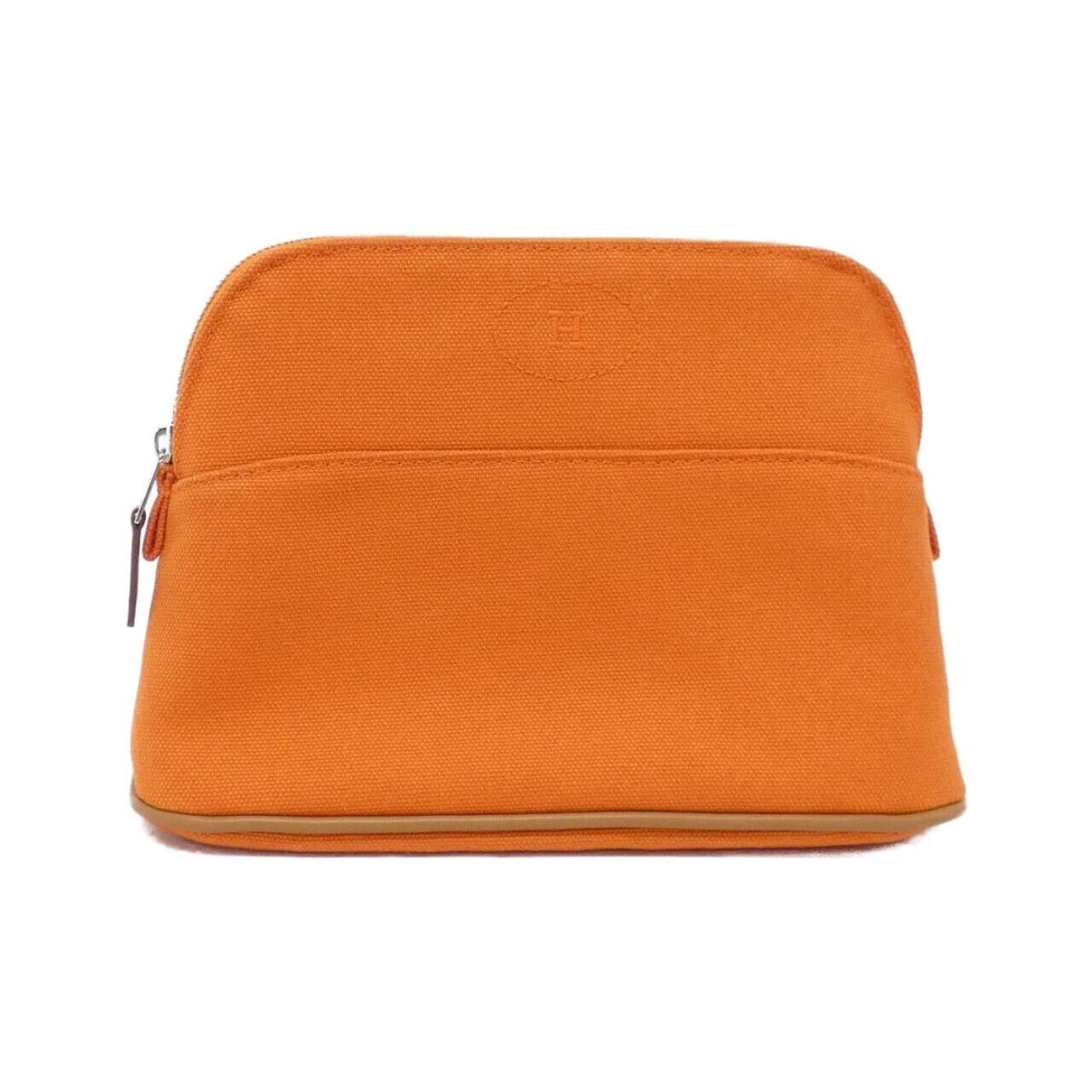 Hermes Pouch Canvas: Hermes Pouch Canvas The Hermes Pouch Canvas features a vibrant orange canvas material and silver hardware, giving it a bold and eye-catching design. With its compact size of 14cm x 20cm x 7cm, this po