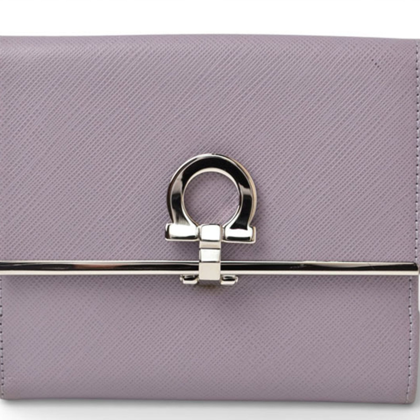 Salvatore Ferragamo Wallet (Tri-Fold) Leather: Salvatore Ferragamo Wallet (Tri-Fold) Leather The Salvatore Ferragamo Tri-Fold Wallet is a stylish and functional leather accessory. Made from high-quality leather with a snap fastener closure, this