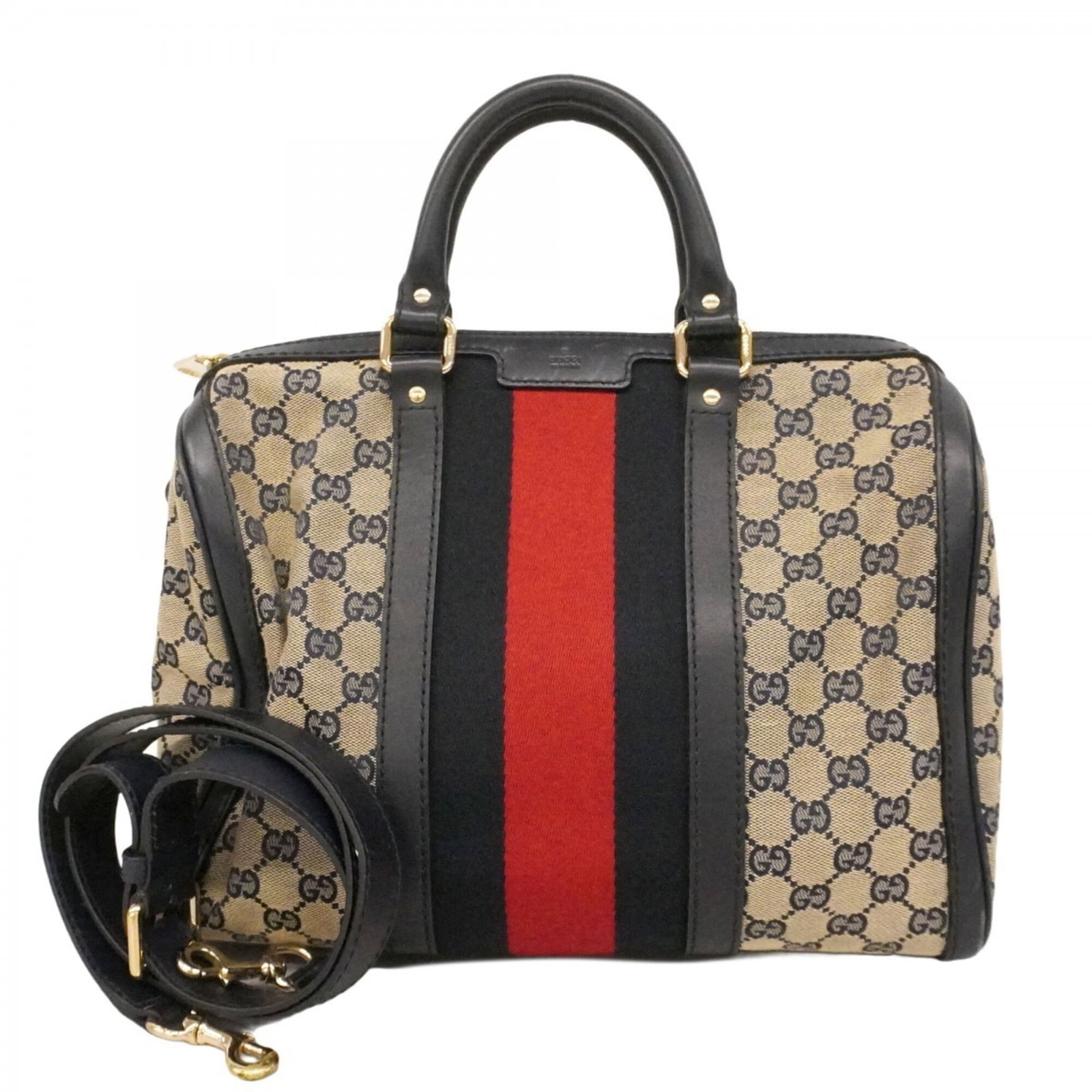 Gucci Handbag Canvas: Gucci Handbag Canvas The Gucci Handbag Canvas is a navy blue canvas bag with champagne gold hardware, featuring a classic design. With its 27cm x 32cm x 18cm dimensions and used condition, this bag