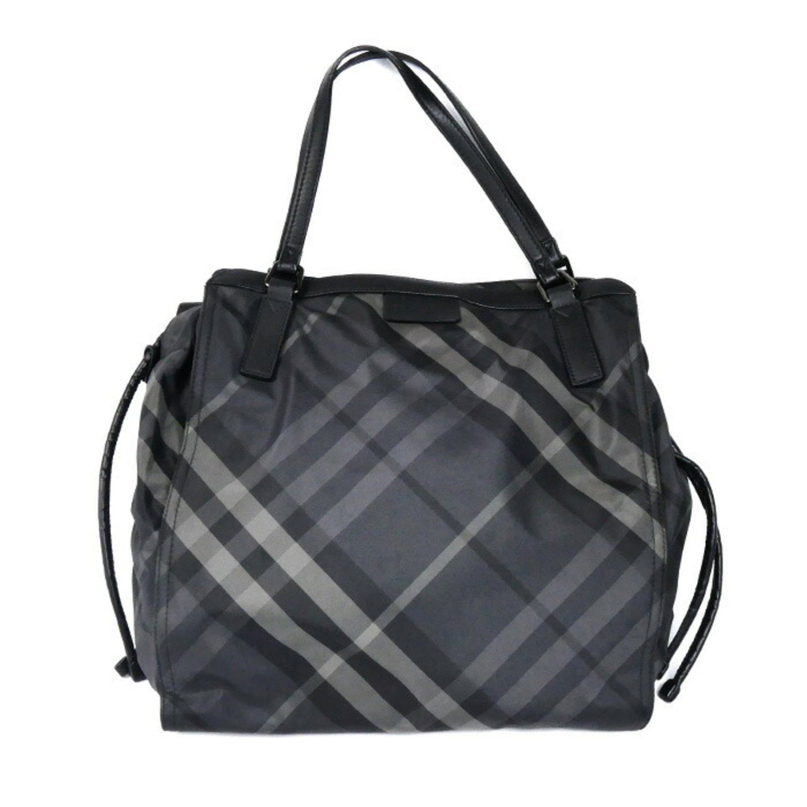 Burberry Tote Bag Nylon Leather: Burberry Tote Bag Nylon Leather Burberry's iconic tote bag combines durable nylon and high-quality leather in a sleek black design. With its classic dimensions of 38cm x 33cm x 6.5cm, this versatile b