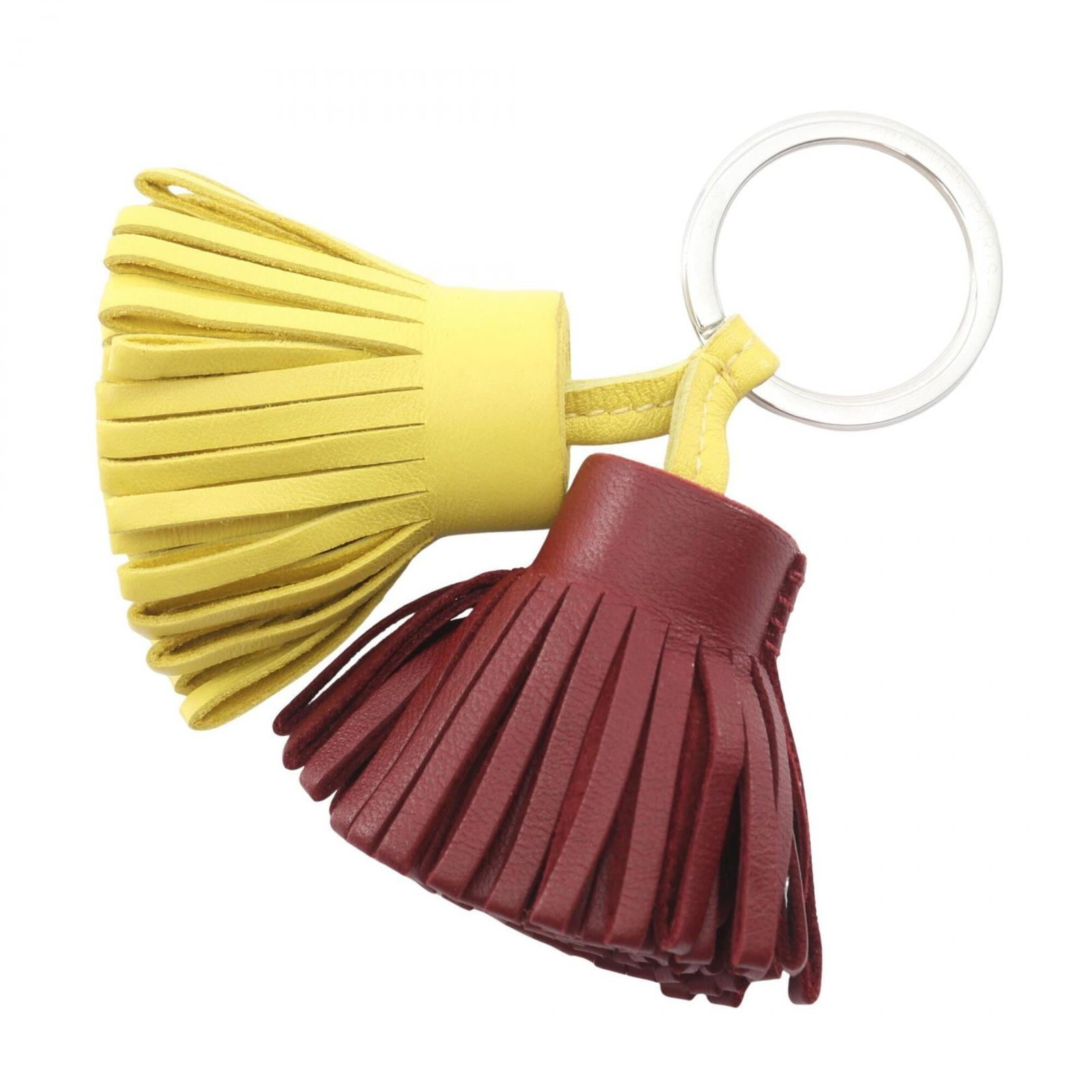 Hermes Key Chain Agneau Milo Leather: Hermes Key Chain Agneau Milo Leather Agneau Milo Leather from Hermes adds an air of sophistication to this key chain. The Bordeaux and Yellow hues are beautifully complemented by the silver charm, cre