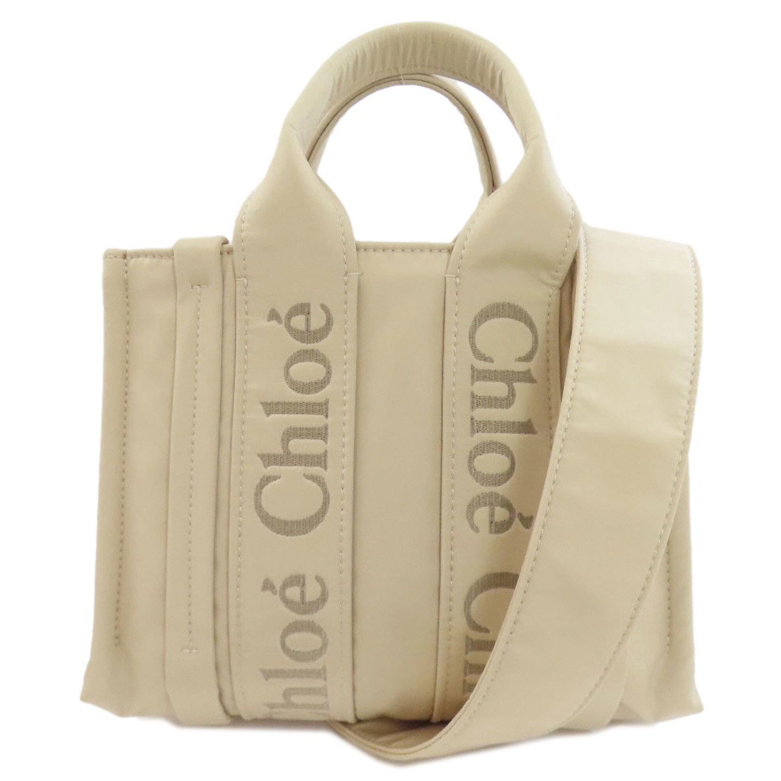Chlo Handbag Nylon: Chlo Handbag Nylon Chlo Handbag Nylon in Beige - A stylish and versatile accessory. This used Chlo handbag features nylon material, measuring 18.5cm x 25.5cm x 8cm, with a few traces of usage visible,
