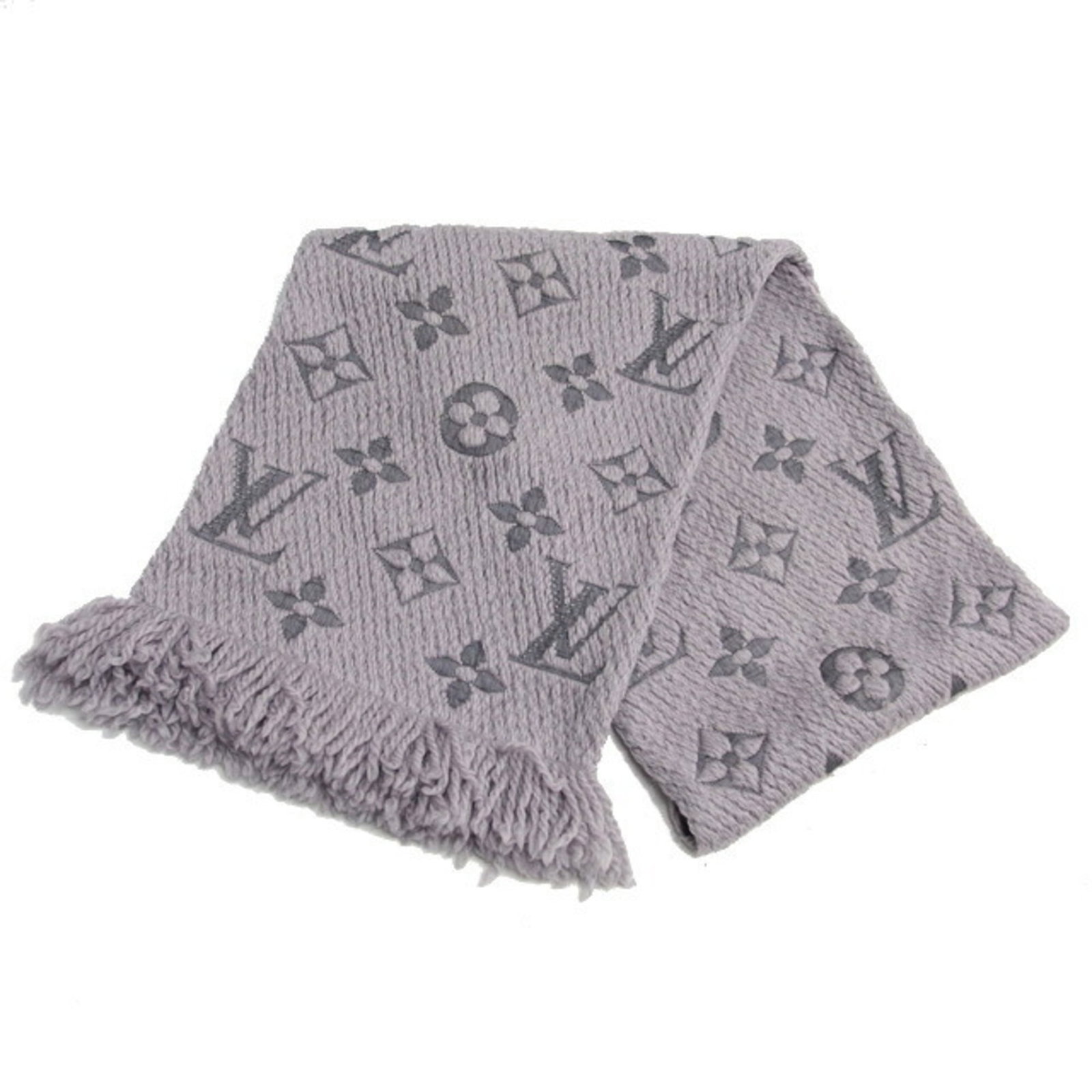 Louis Vuitton Stole Wool 94% Silk 6%: Louis Vuitton Stole Wool 94% Silk 6% Stole from Louis Vuitton in excellent condition, this piece boasts a unique blend of wool and silk. Featuring a light gray color and a sizeable 1.62m x 29cm design