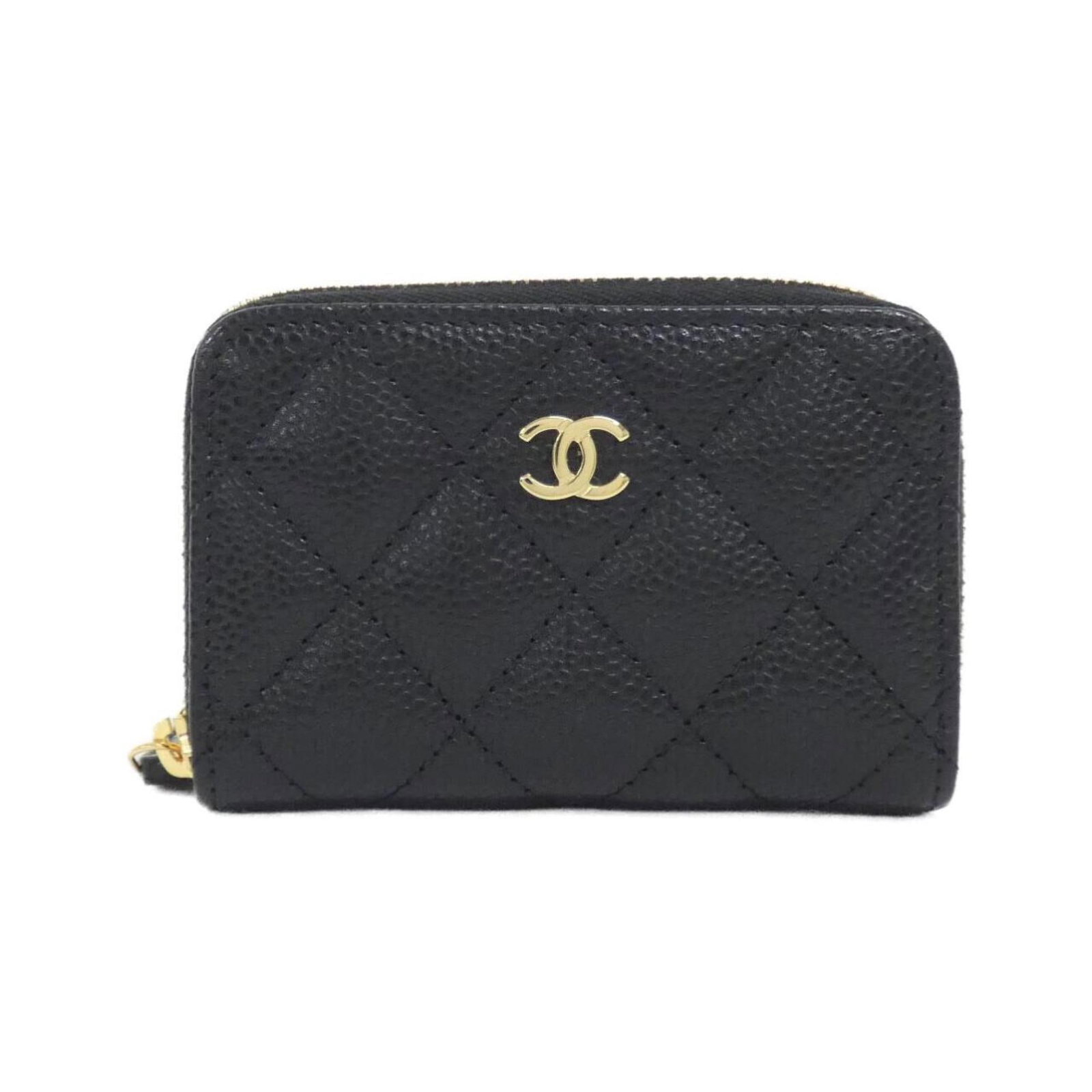 Chanel Coin Purse/Coin Case Grained Calfskin: Chanel Coin Purse/Coin Case Grained Calfskin This Chanel Coin Purse/Coin Case is crafted from high-quality grained calfskin in a sleek black finish. Measuring 7cm x 10cm x 2cm, its compact size makes 