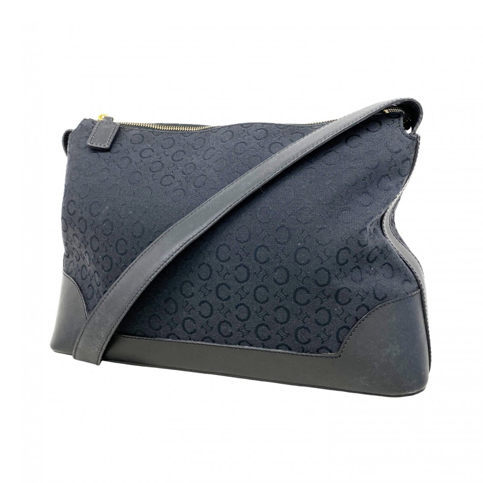 Celine Shoulder Bag Canvas: Celine Shoulder Bag Canvas This Celine Shoulder Bag Canvas in black features gold hardware and a sturdy canvas material. With its classic design and timeless appeal, this bag has been worn and shows s