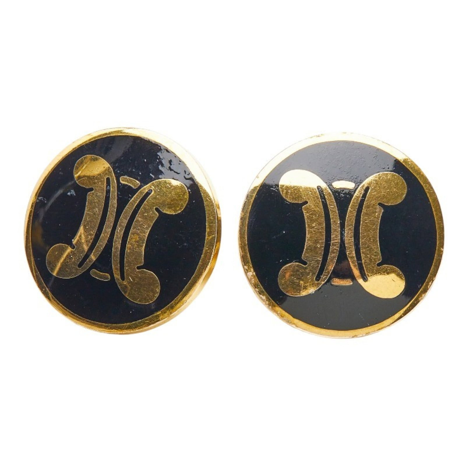Celine Clip Earrings Enamel: Celine Clip Earrings Enamel Celine Clip Earrings Enamel are a stylish accessory featuring enamel design. They have a black and gold color scheme and measure 27.60mm x 27.60mm in size. The earrings are