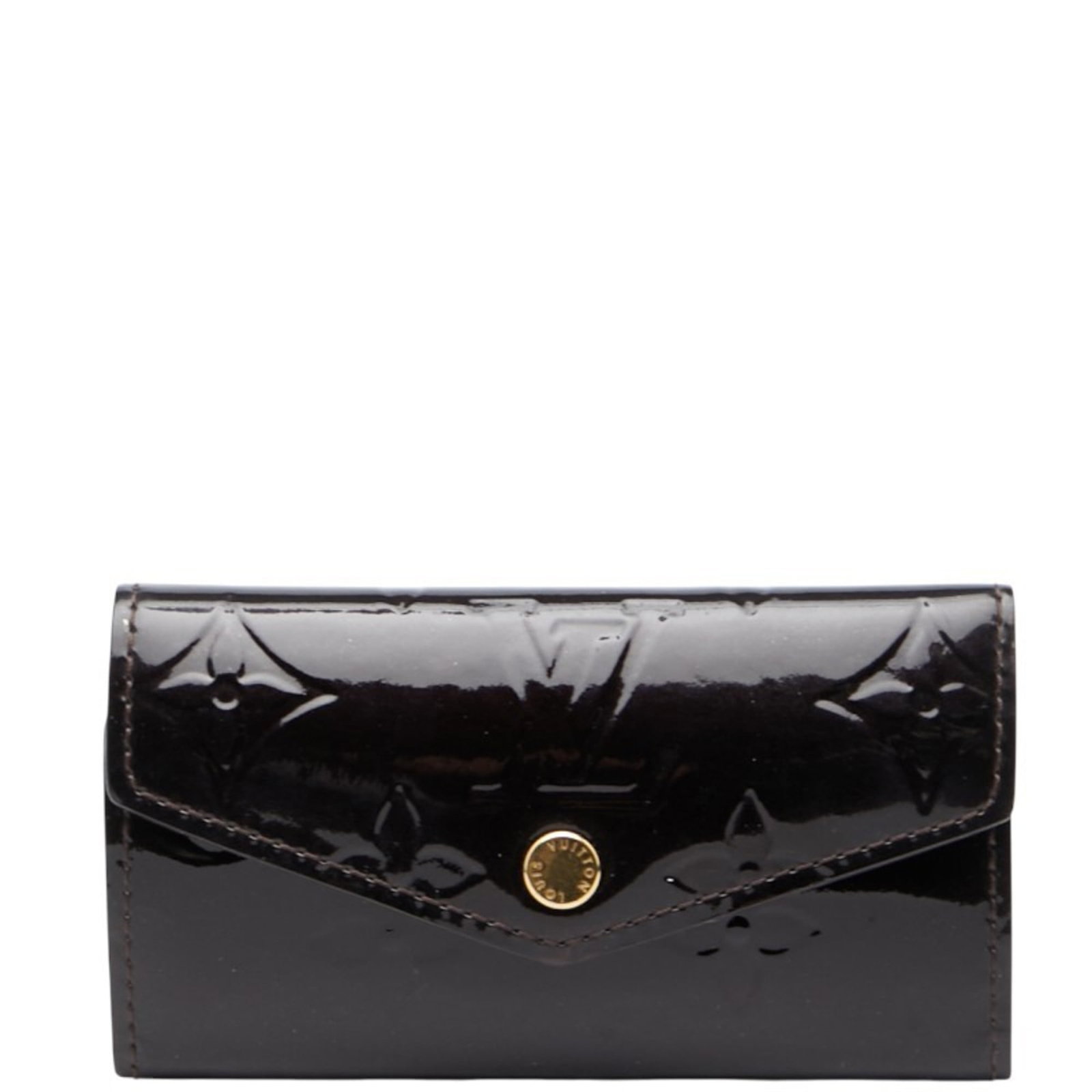 Louis Vuitton Keycase Patent Leather: Louis Vuitton Keycase Patent Leather Amarante Brown Louis Vuitton Keycase features patent leather construction and bears a signature. The item has traces of usage with scratches and dirt visible, indi