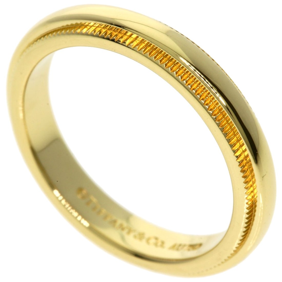 K18 Yellow Gold Ring from Tiffany&Co: K18 Yellow Gold Ring from Tiffany&Co K18 Yellow Gold Ring from Tiffany&Co boasts its luxurious K18 gold metal, a rare and precious material. This stunning ring features no main stone, allowing its