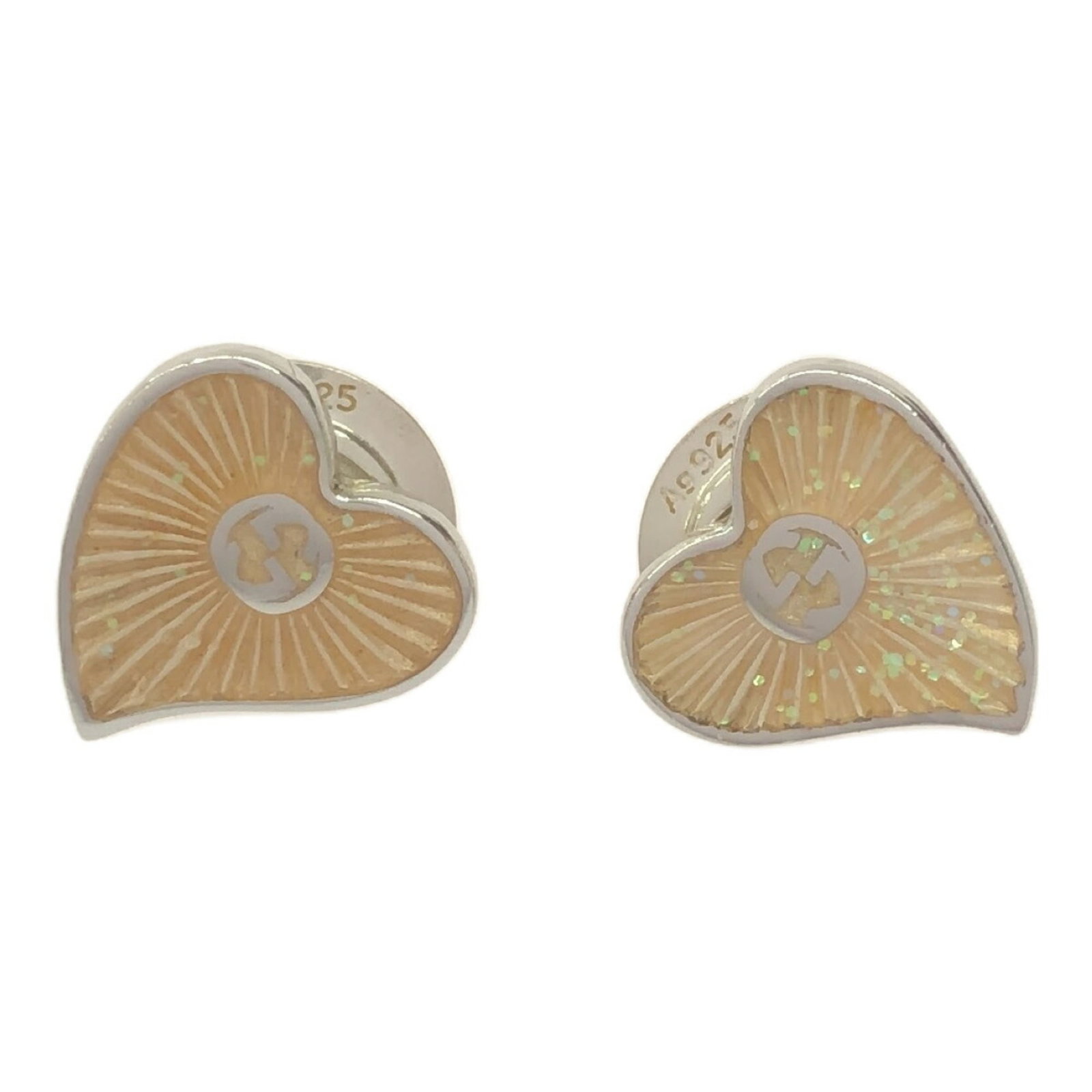 Gucci Clip Earrings Silver 925: Gucci Clip Earrings Silver 925 Silver 925 clip earrings from Gucci feature an ivory pendant with a subtle design. The delicate 1.10mm length and 0.80mm x 0.03'' stone size add to the elegant charm of 