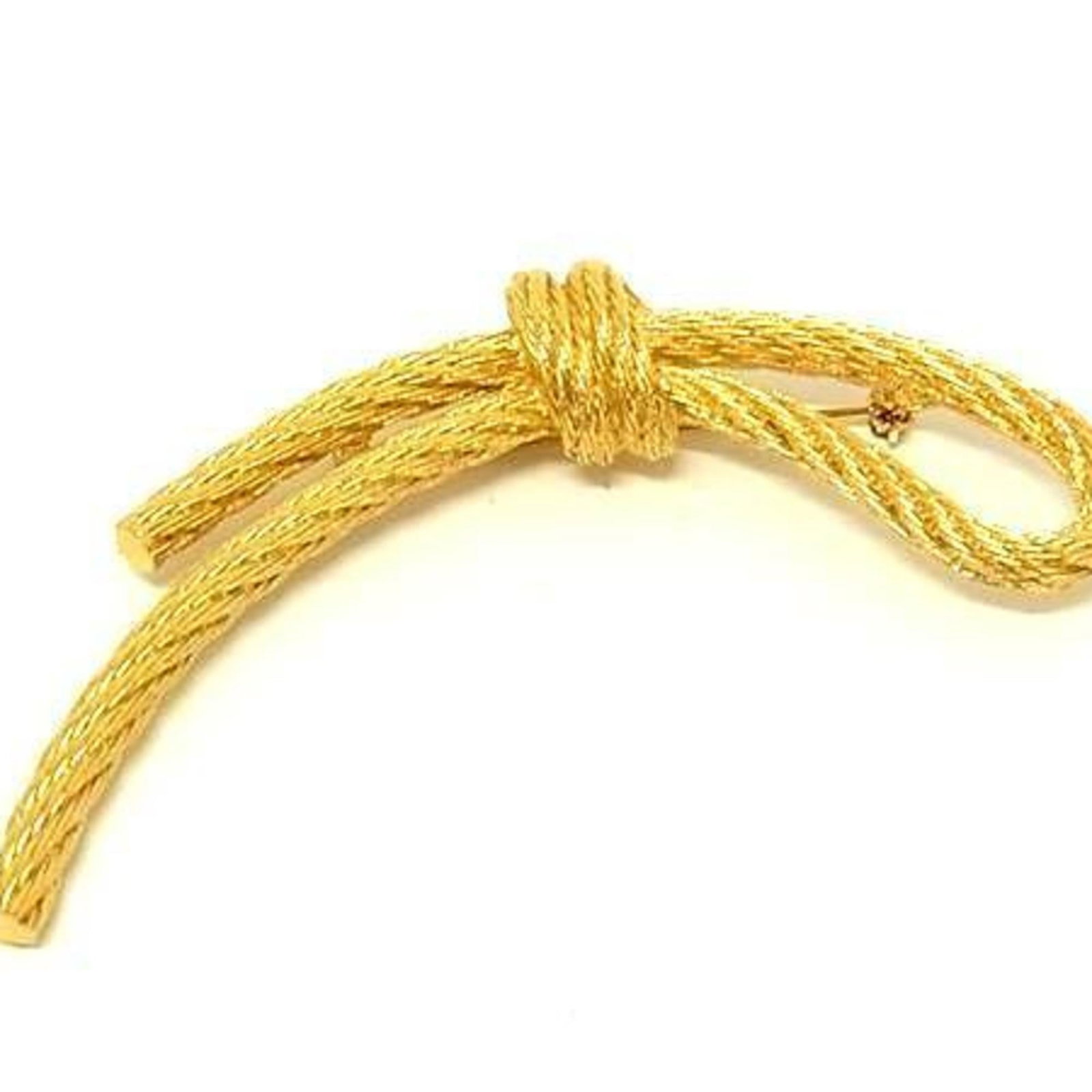 Christian Dior Brooch Metal: Christian Dior Brooch Metal Gold Christian Dior Brooch in Mint Condition. This beautifully crafted brooch features metal construction and showcases a luxurious gold finish. A like new item with minima