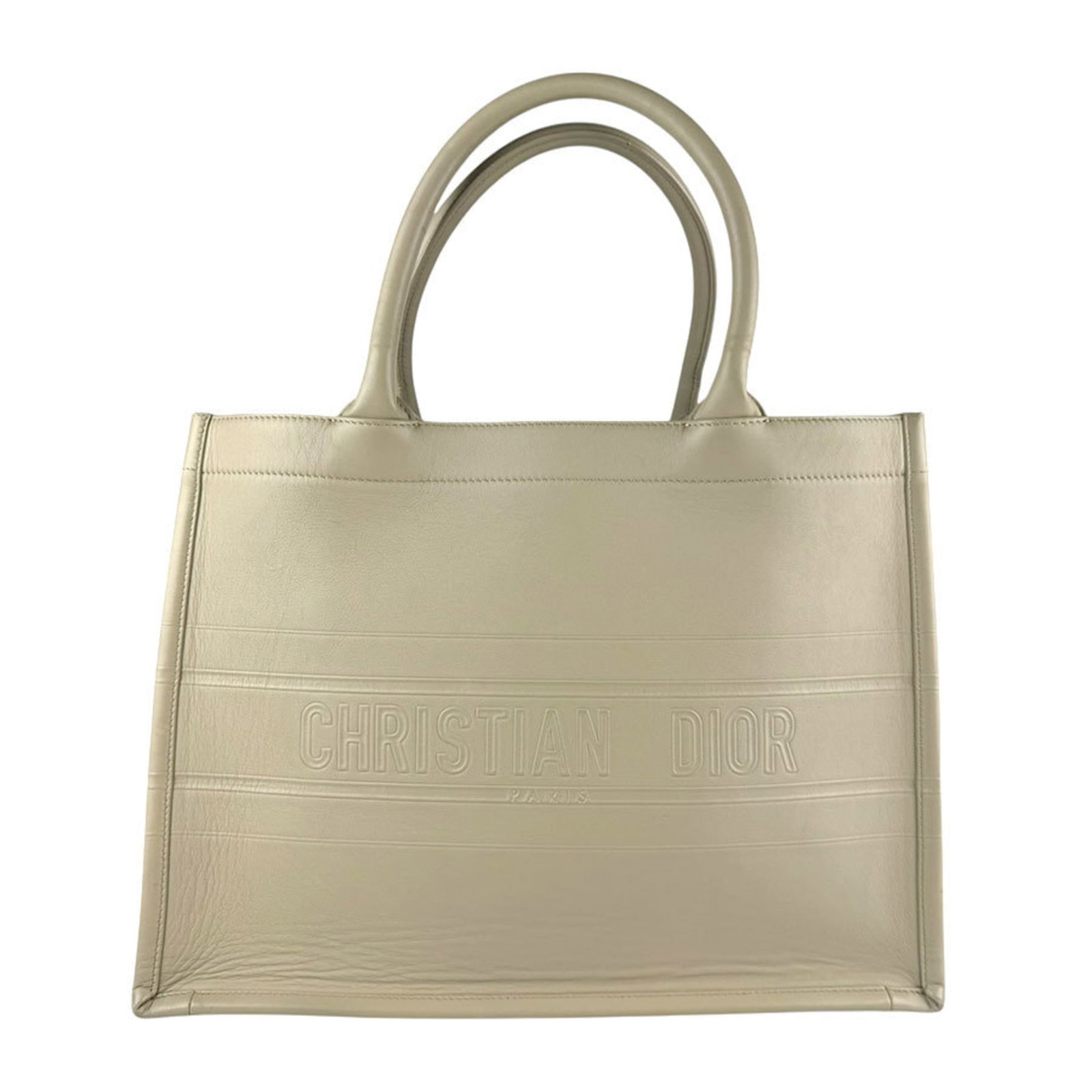Christian Dior Handbag Leather: Christian Dior Handbag Leather The Christian Dior handbag features high-quality beige leather and measures 27cm x 35cm x 17cm. With its classic design and timeless style, this piece exudes elegance an