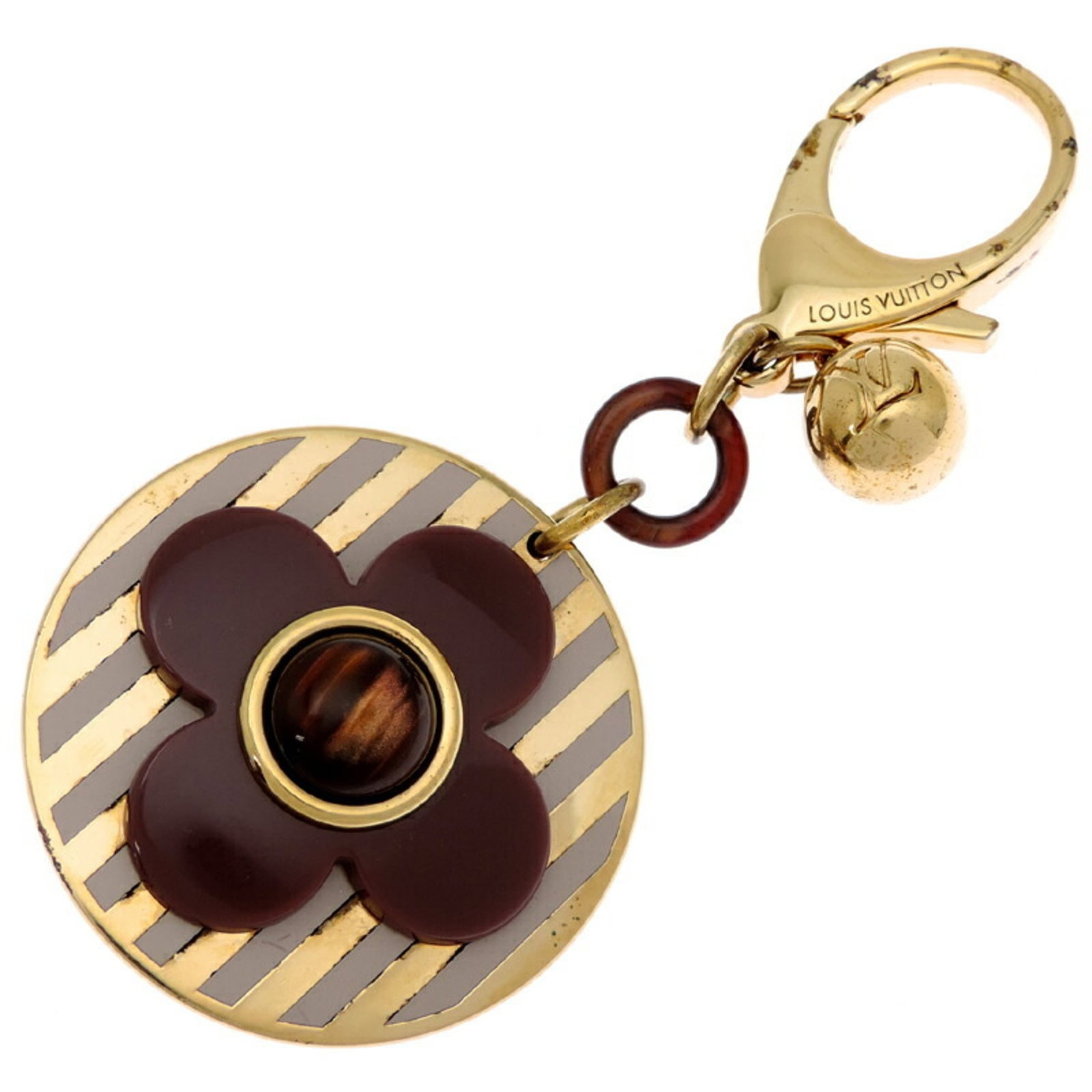 Louis Vuitton Keyring Gold Plating Plastic: Louis Vuitton Keyring Gold Plating Plastic Gold-plated plastic and purple hue make this Louis Vuitton keyring a striking accessory. The item features gold plating and plastic material, with some trace