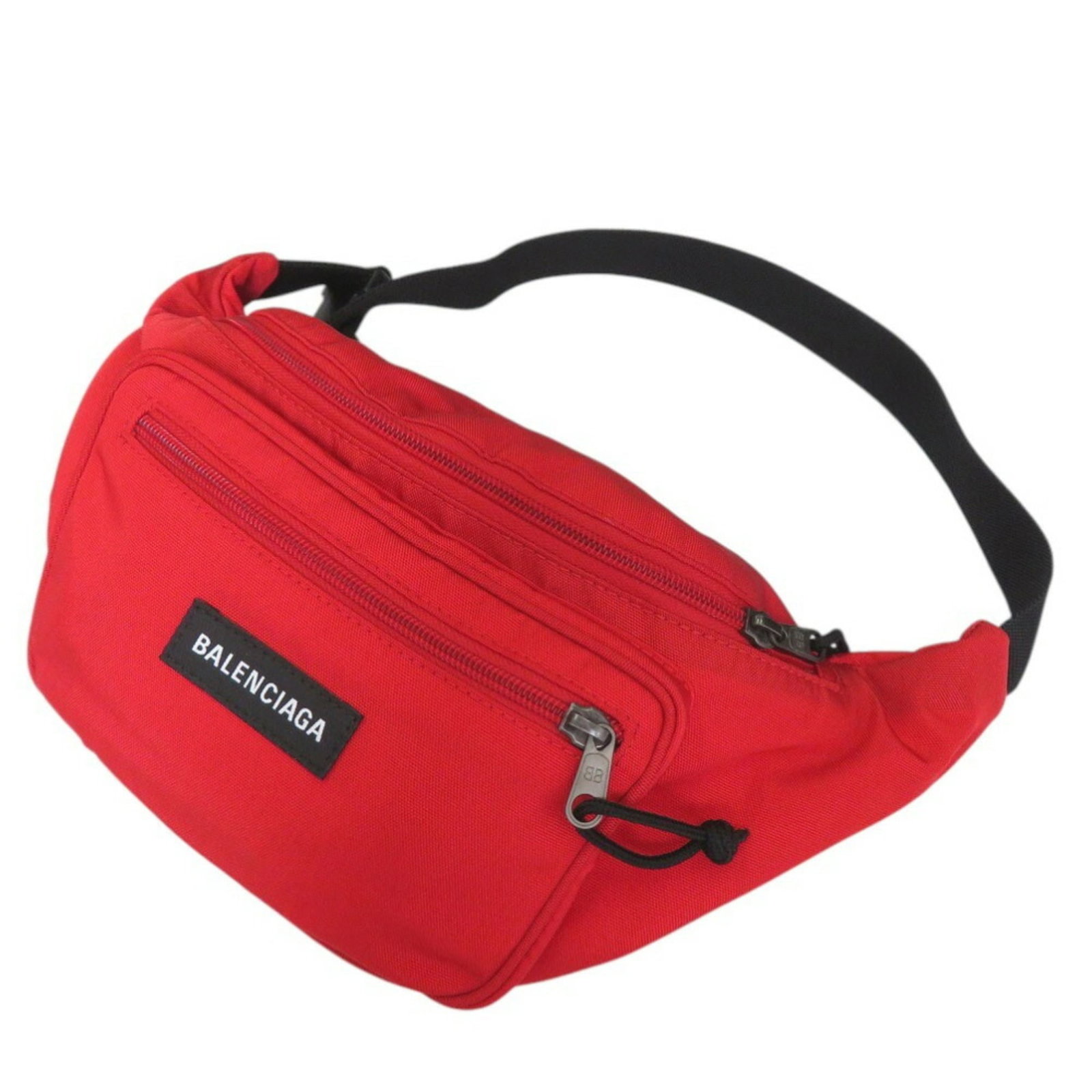 Balenciaga Fanny Pack Sling Bag Nylon: Balenciaga Fanny Pack Sling Bag Nylon Balenciaga's iconic nylon fanny pack sling bag features a bold red color and durable construction. With its classic design and versatile size, this stylish access