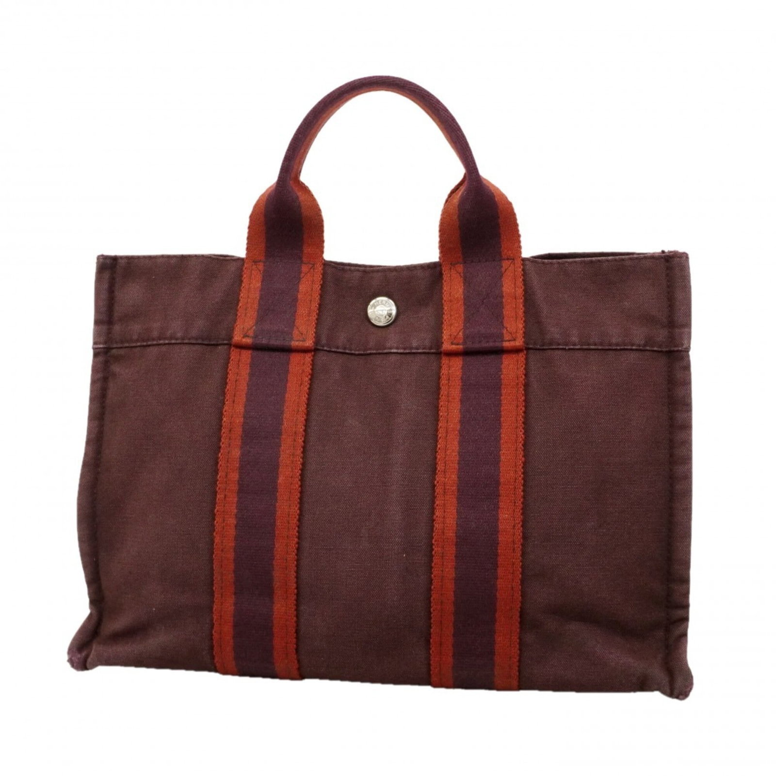 Hermes Tote Bag Canvas: Hermes Tote Bag Canvas Authentic Hermes Tote Bag Canvas for sale. This brown canvas tote bag features silver hardware and measures 22.5cm x 30cm x 7.5cm. With traces of usage visible, this used item