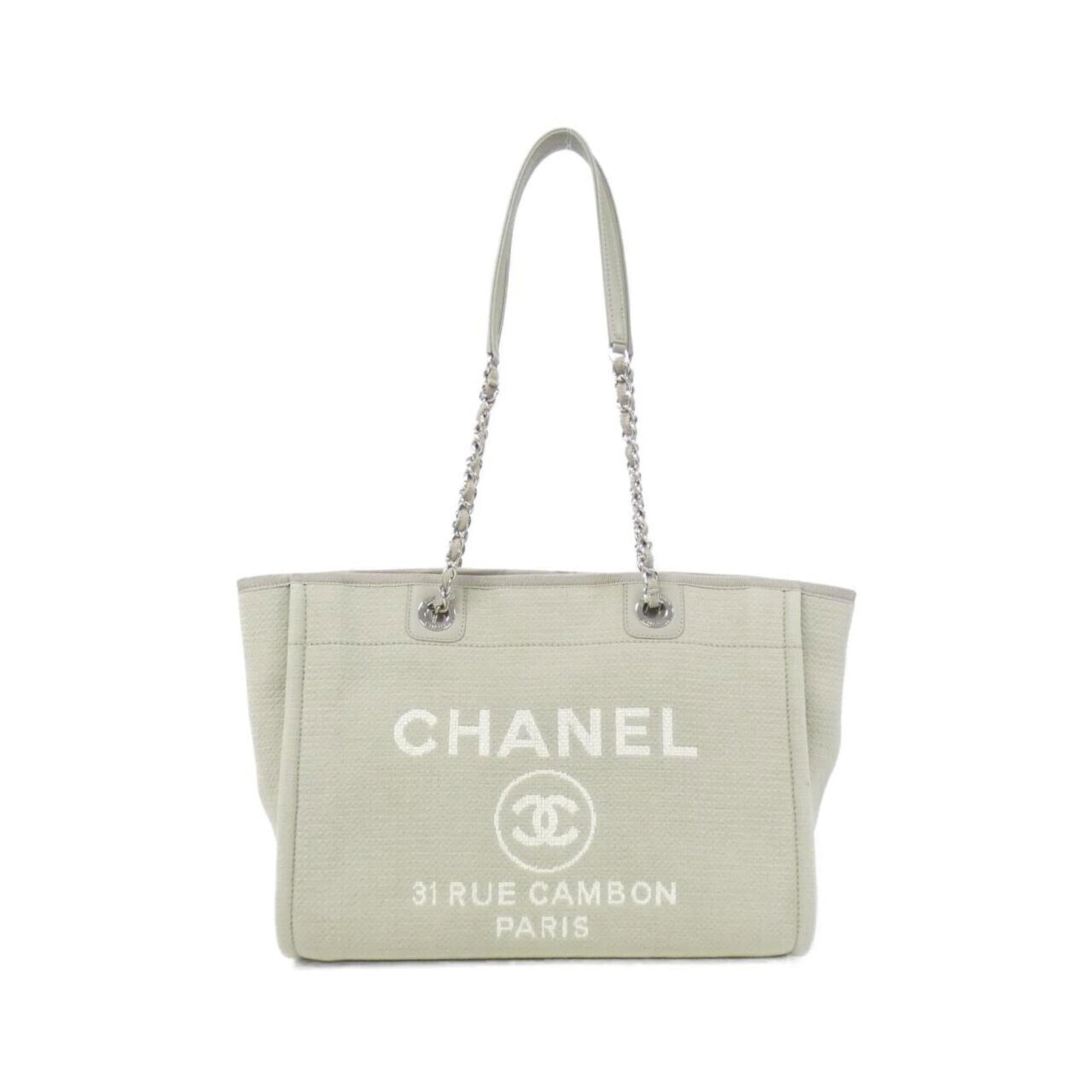 Chanel Handbag: Chanel Handbag Chanel's timeless elegance is on display in this classic gray handbag, featuring silver hardware and a sophisticated design. With its durable construction and comfortable size, this ver